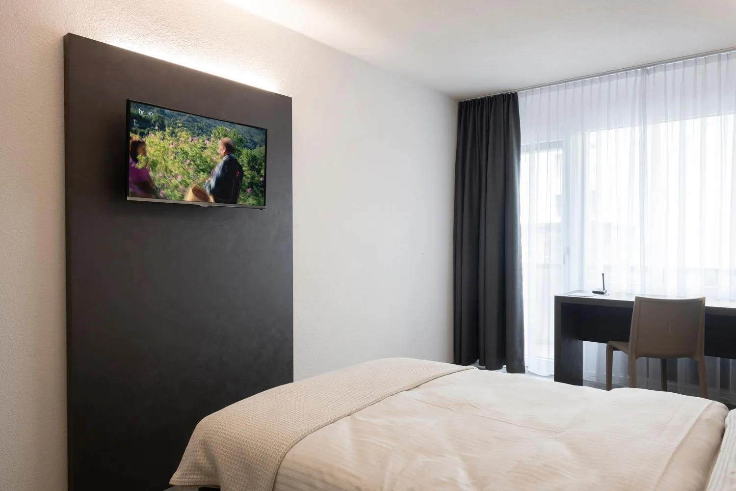 Bed in Hotel Bahnhof Zollikofen