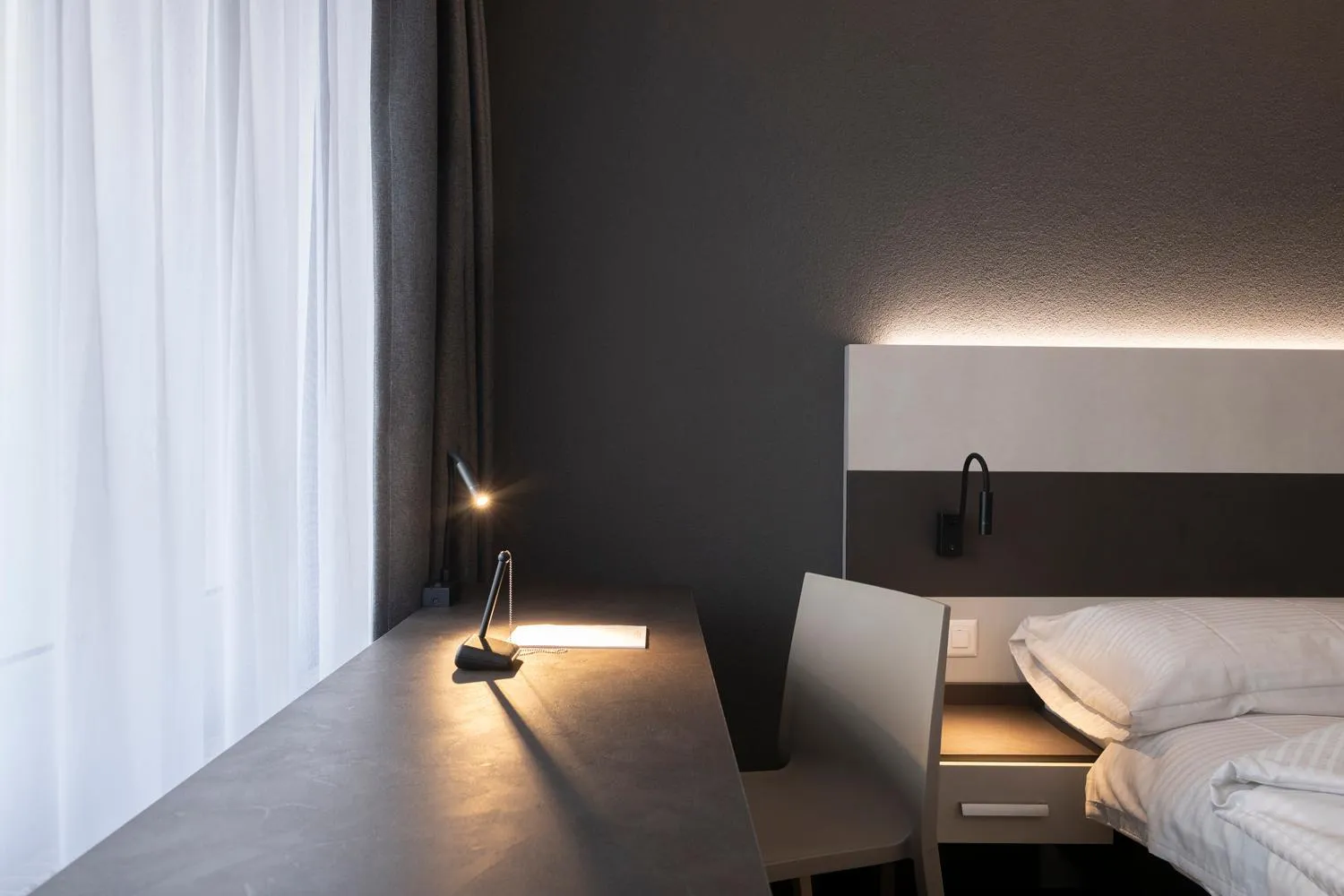 Photo of the whole room, Bed in Hotel Bahnhof Zollikofen