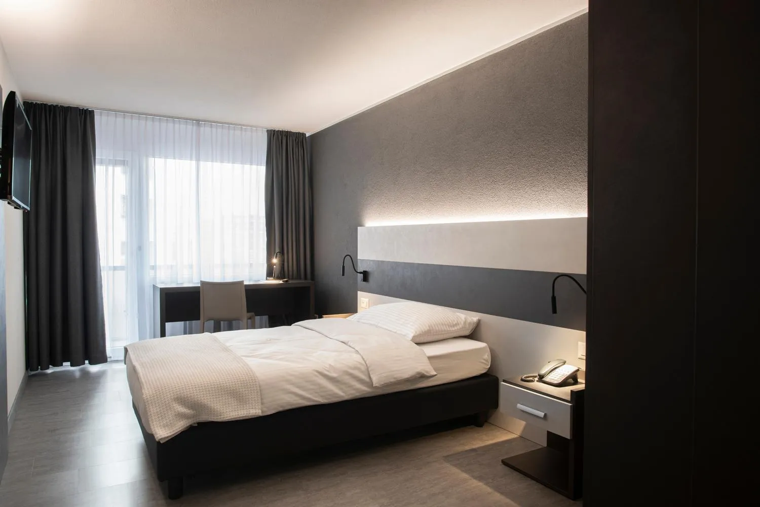 Bed in Hotel Bahnhof Zollikofen