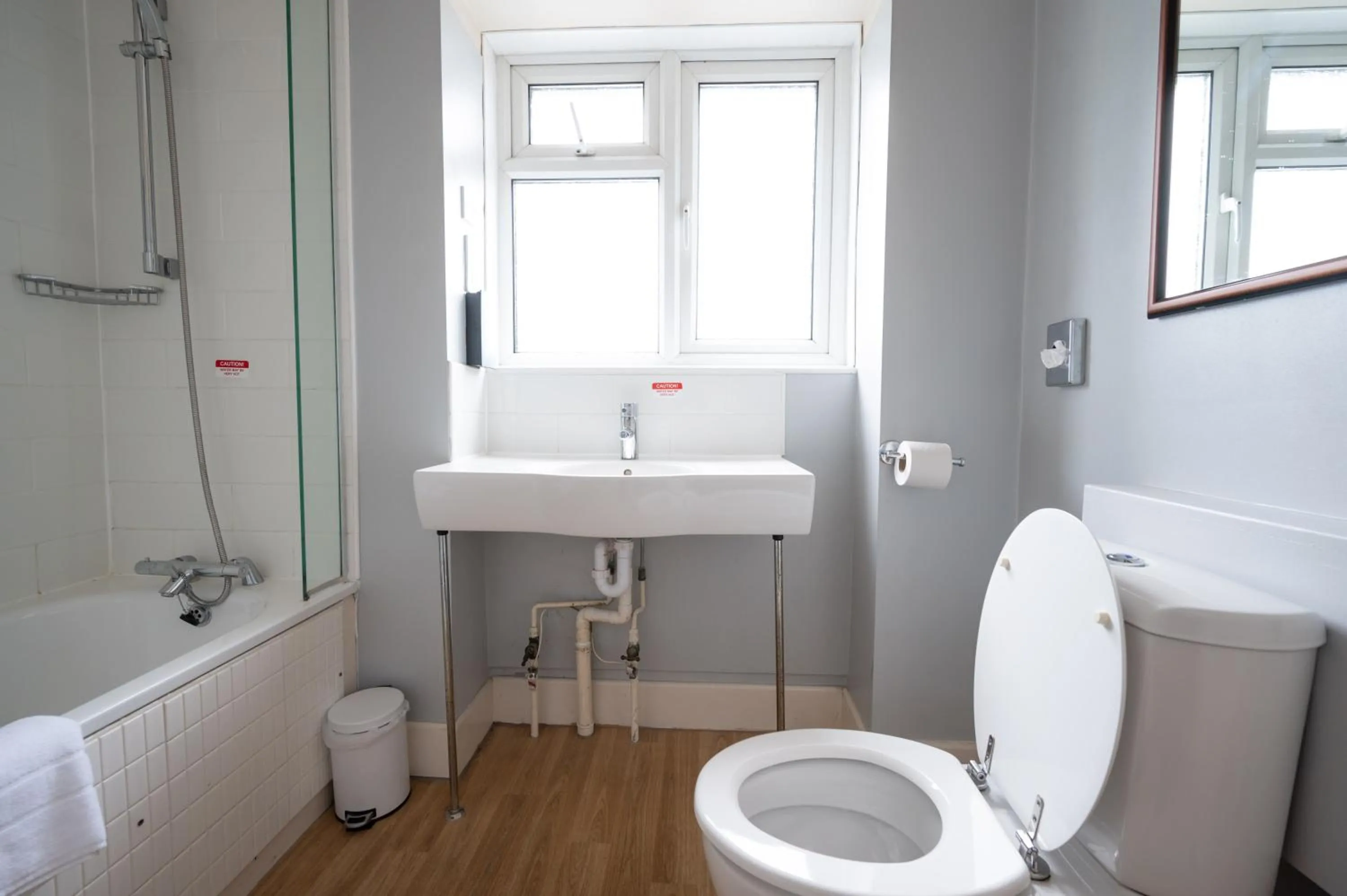 Bathroom in Commodore Hotel by Greene King Inns
