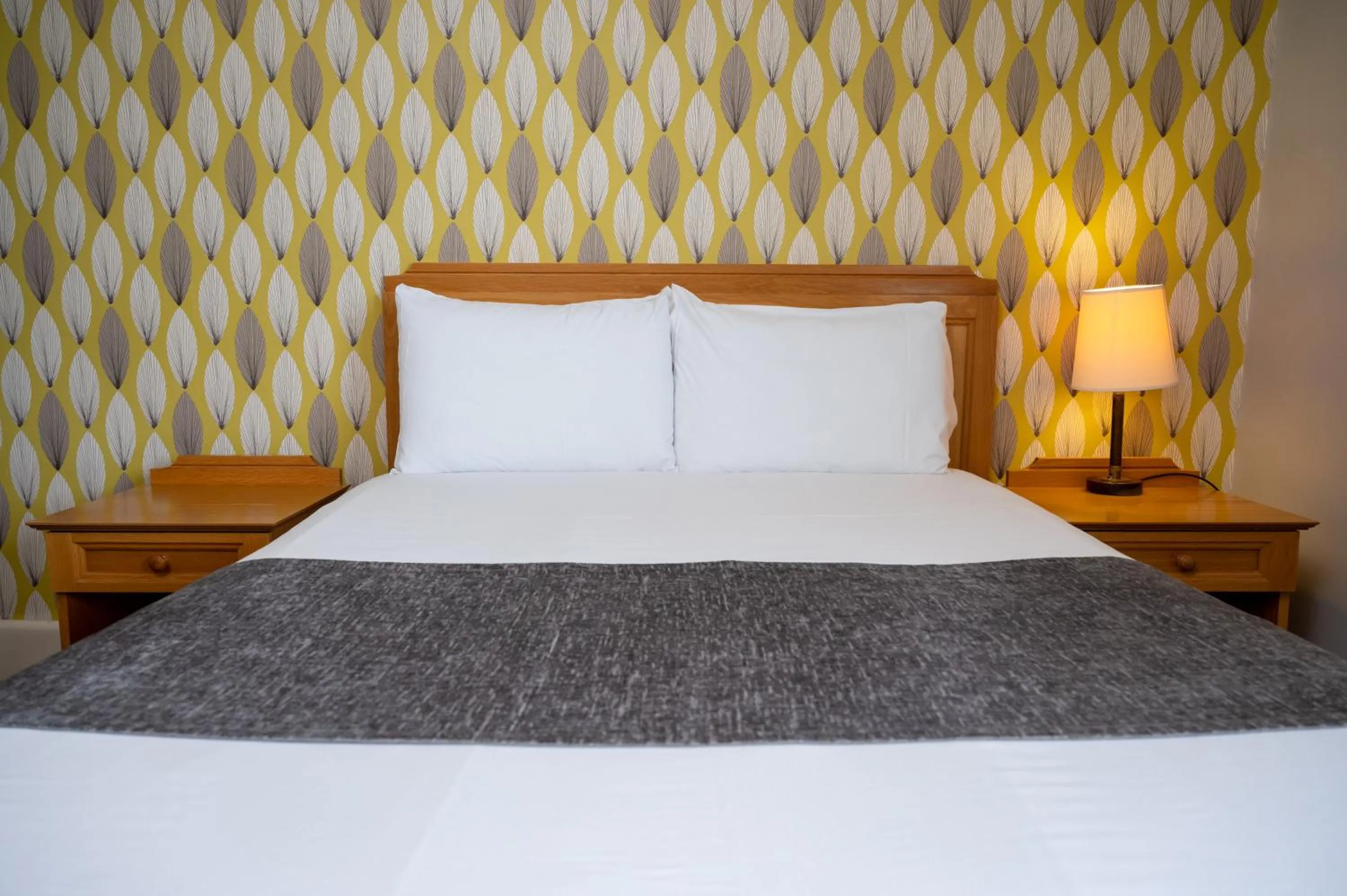 Bed in Commodore Hotel by Greene King Inns