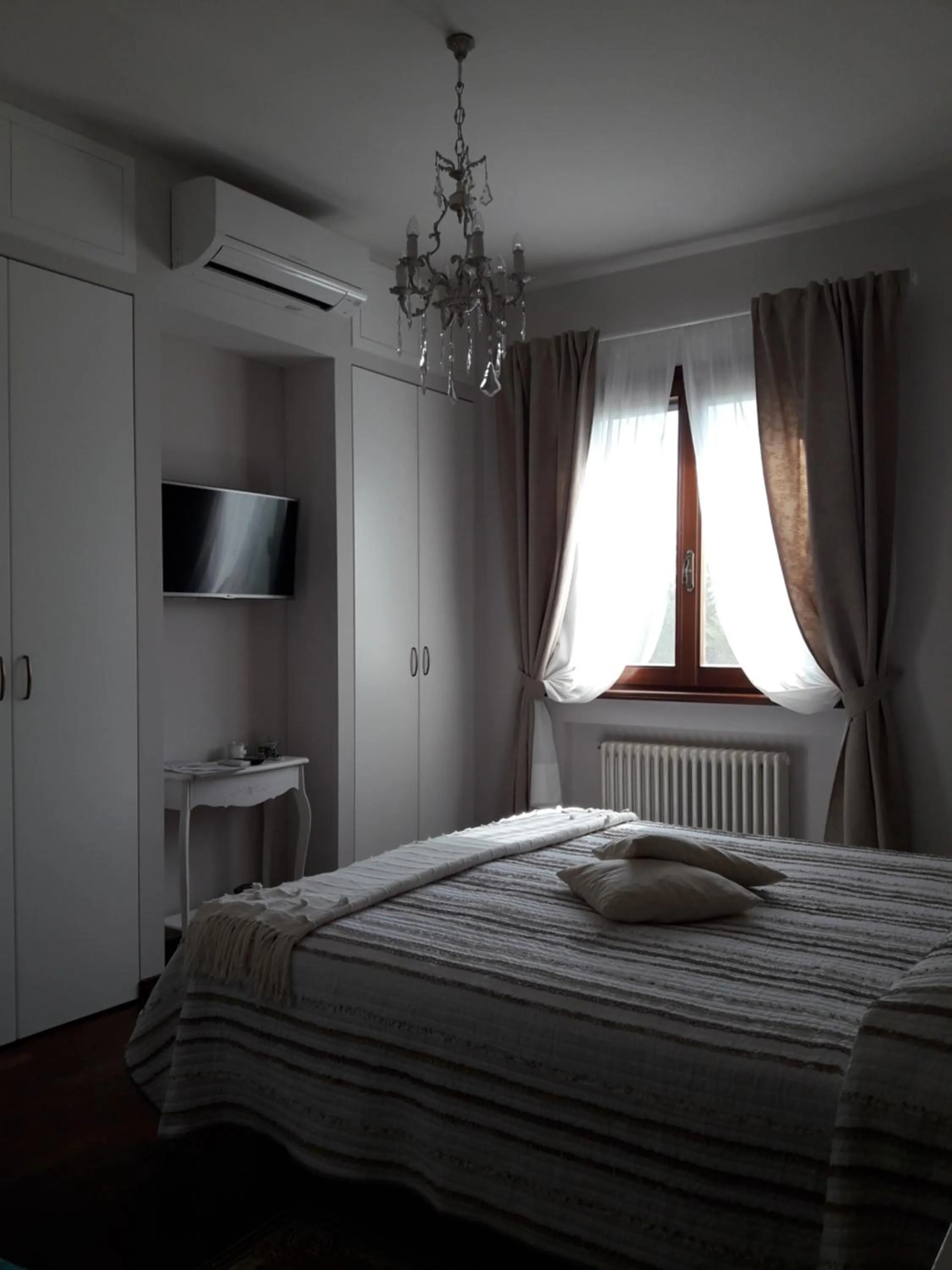 Photo of the whole room, Bed in CasaVittorio