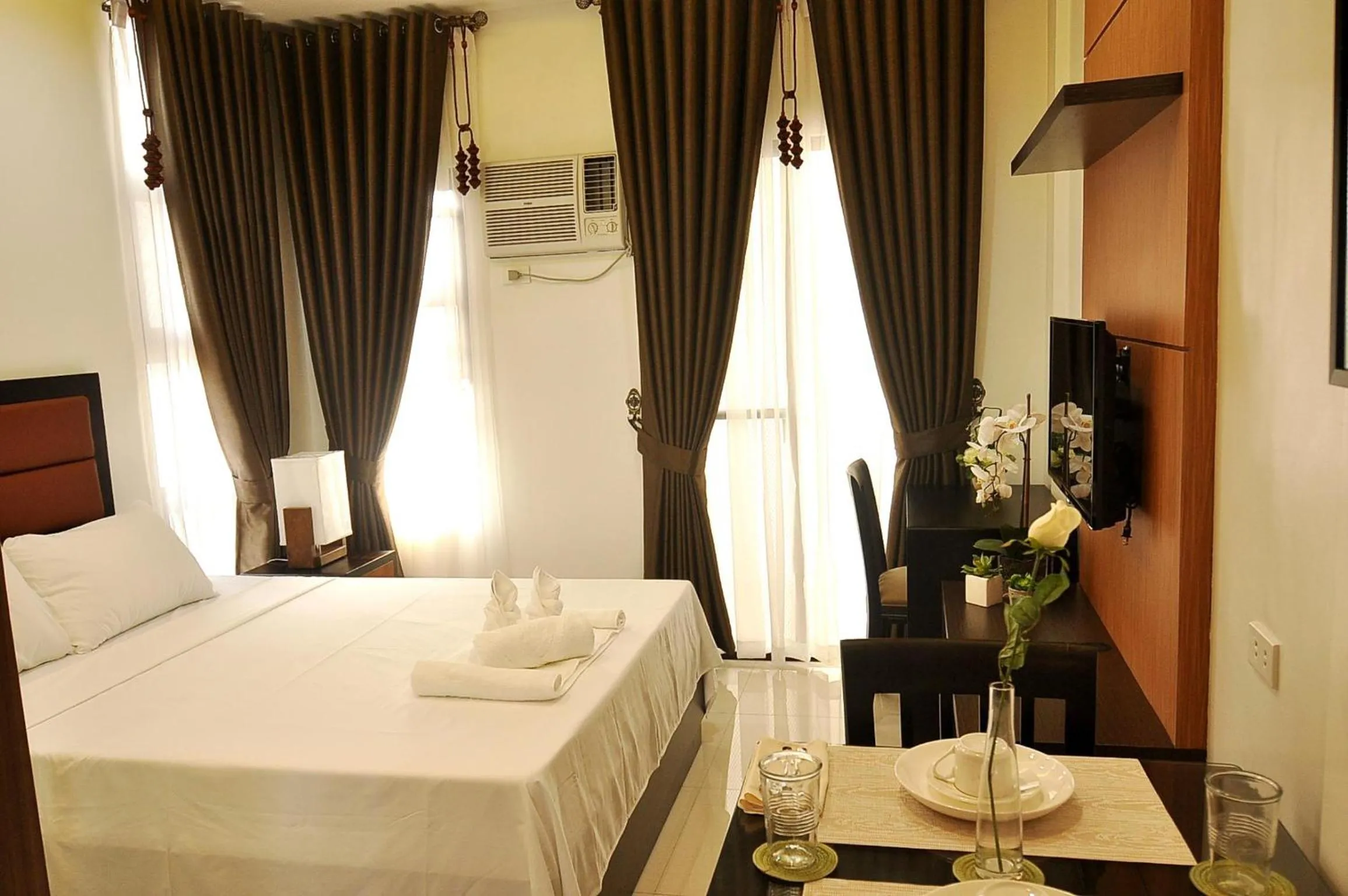 Living room, Bed in Rishan Village Residences