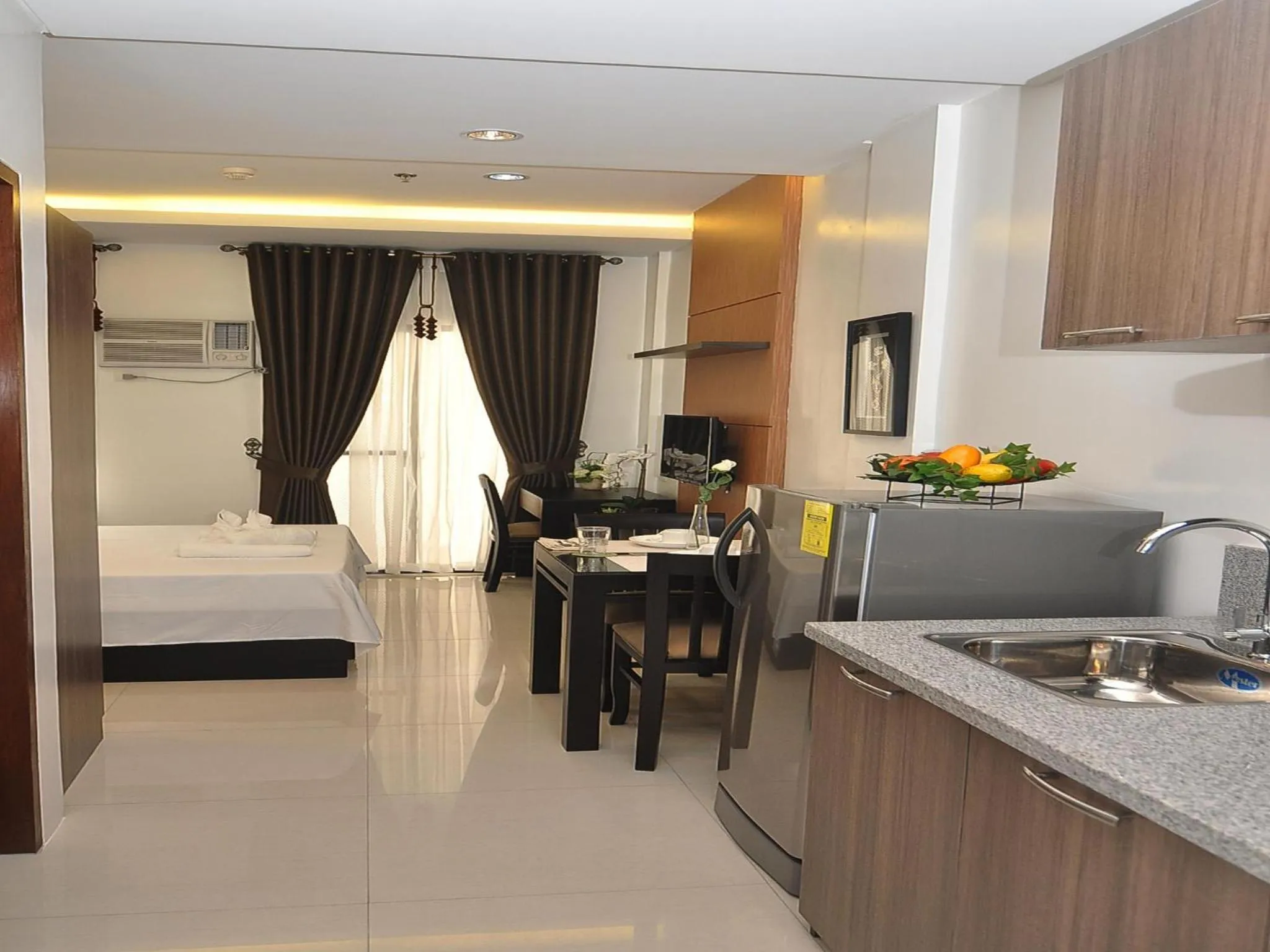 Kitchen or kitchenette, Bed in Rishan Village Residences