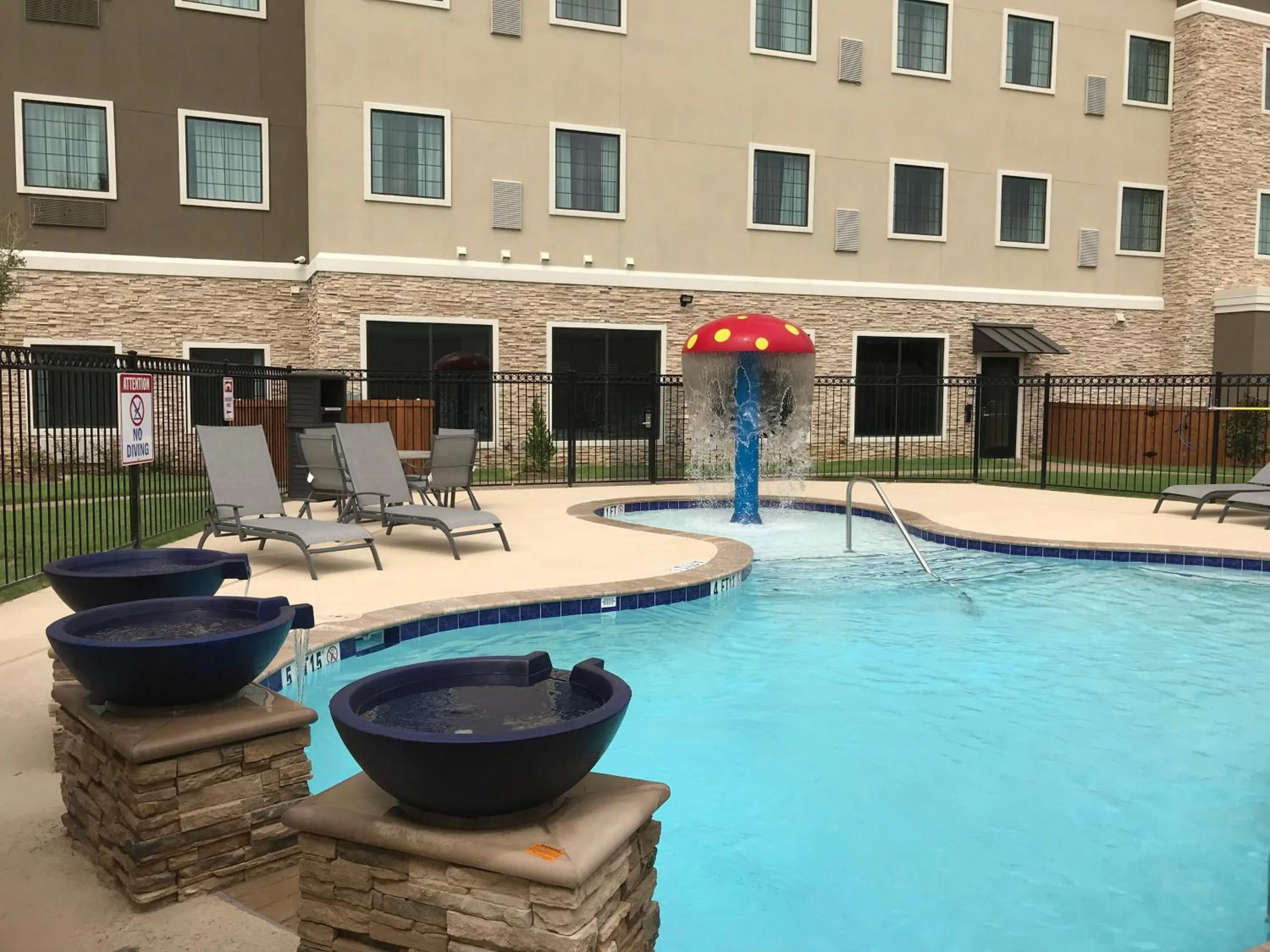 Swimming pool in Staybridge Suites Plano - The Colony by IHG