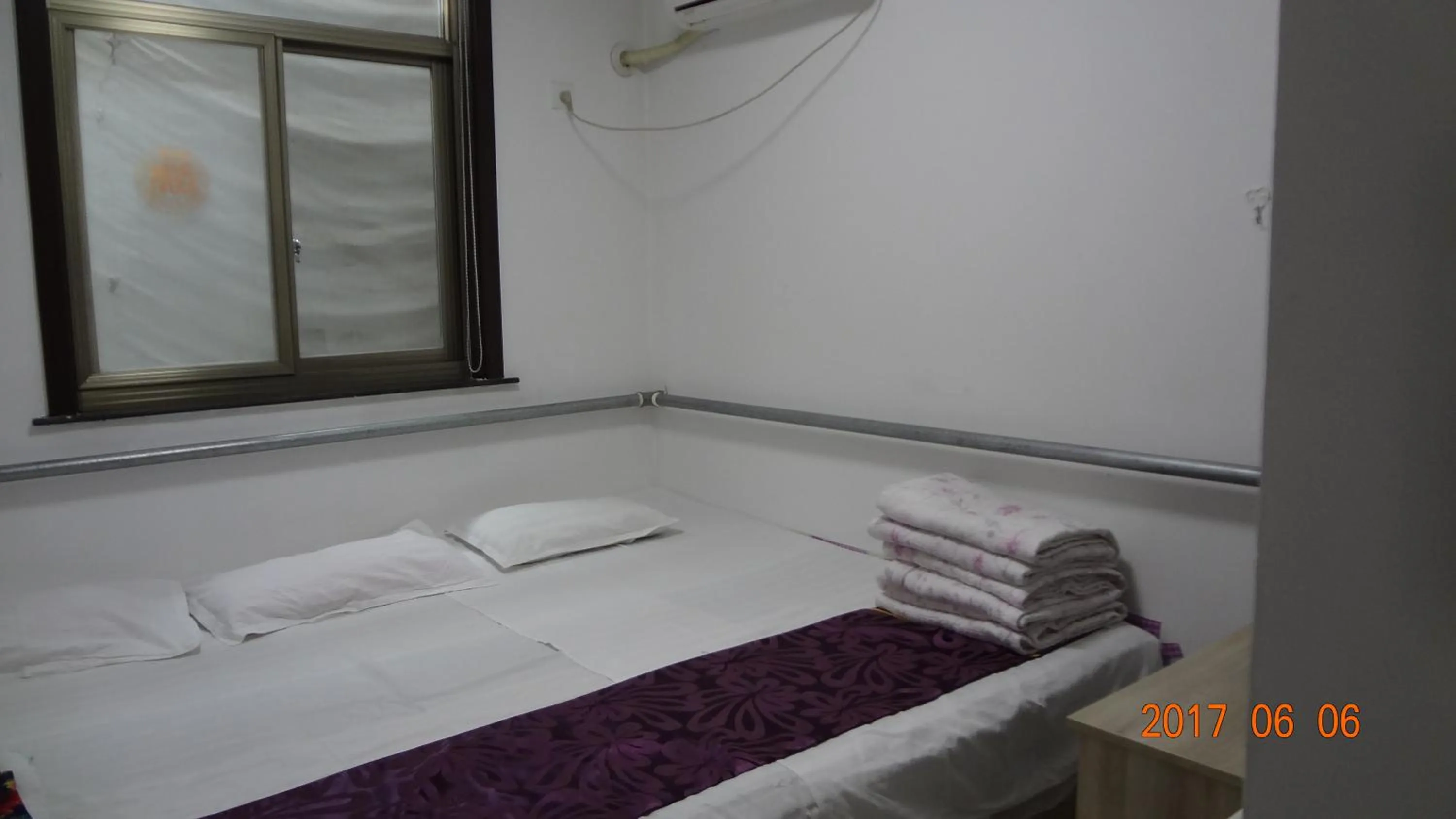 Bed in Huangyaguan Great Wall Li Bo Home Hotel