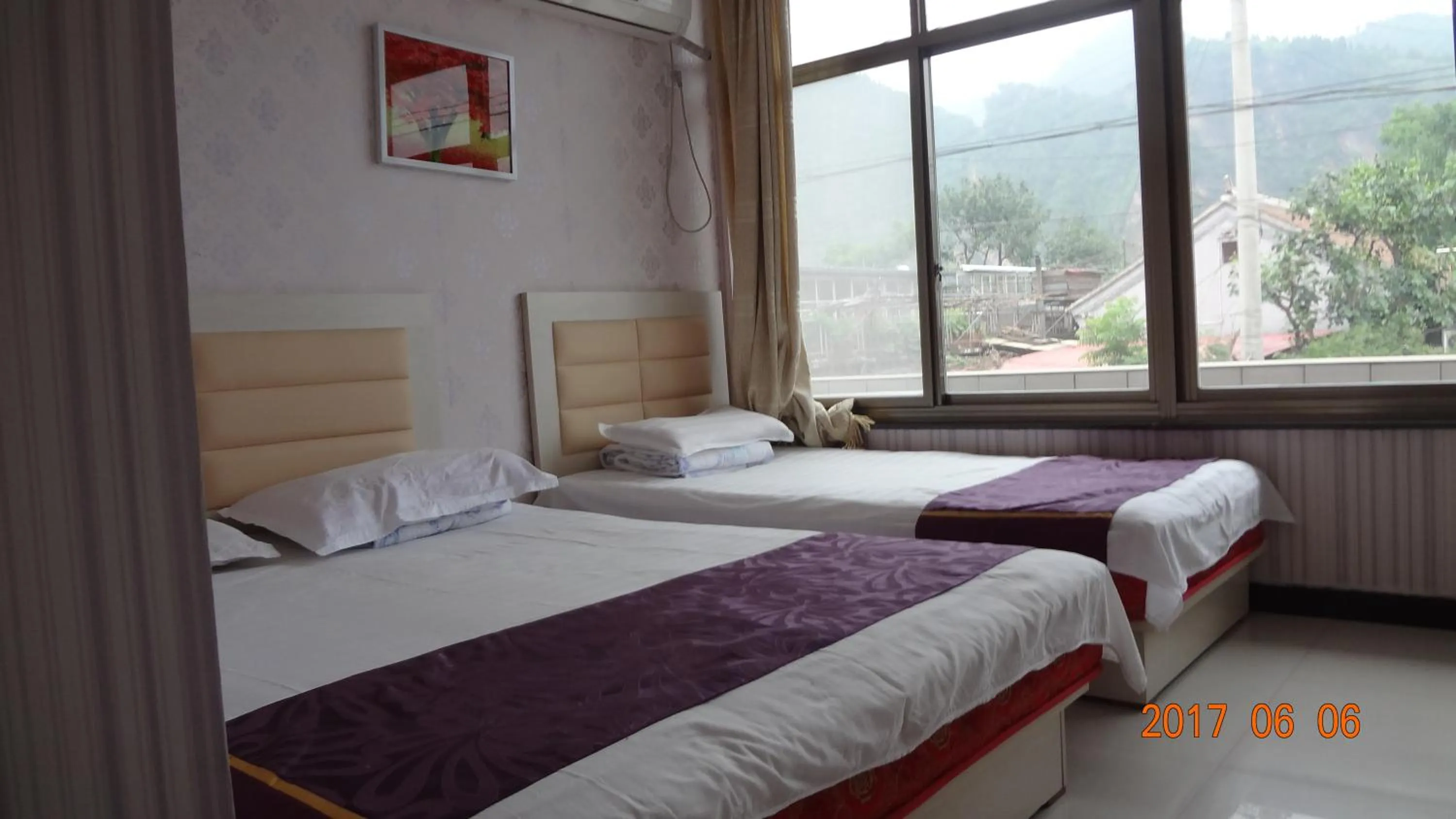 Bed in Huangyaguan Great Wall Li Bo Home Hotel