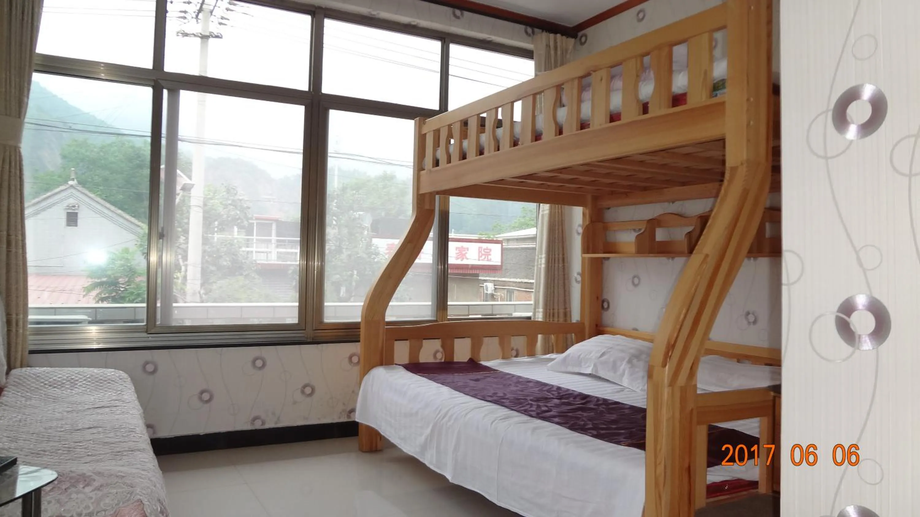 Bed in Huangyaguan Great Wall Li Bo Home Hotel