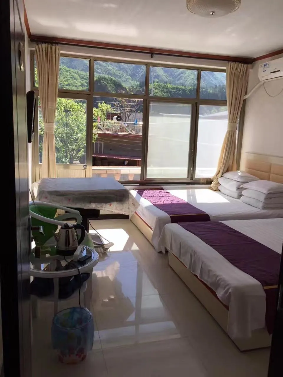 Bed in Huangyaguan Great Wall Li Bo Home Hotel