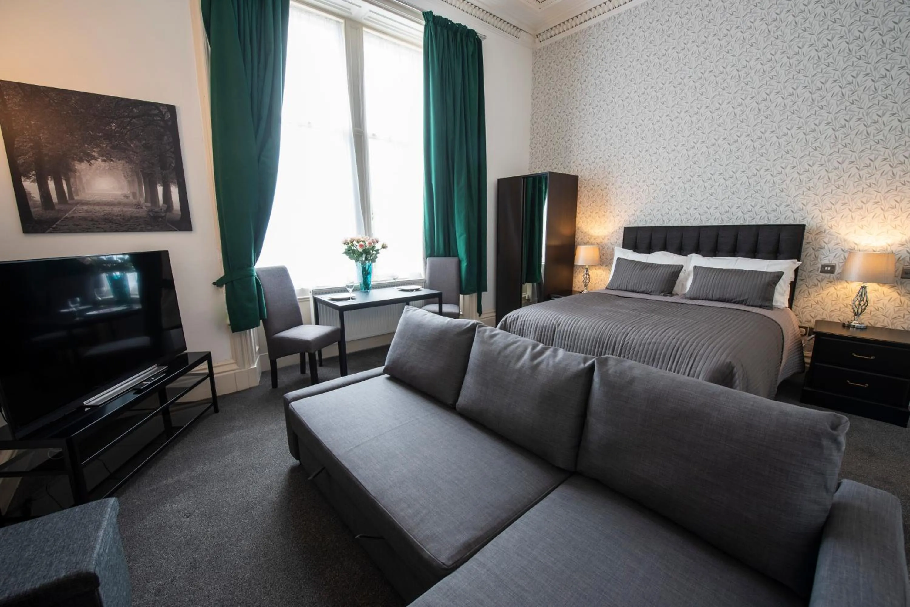 Bed in Grosvenor Suites