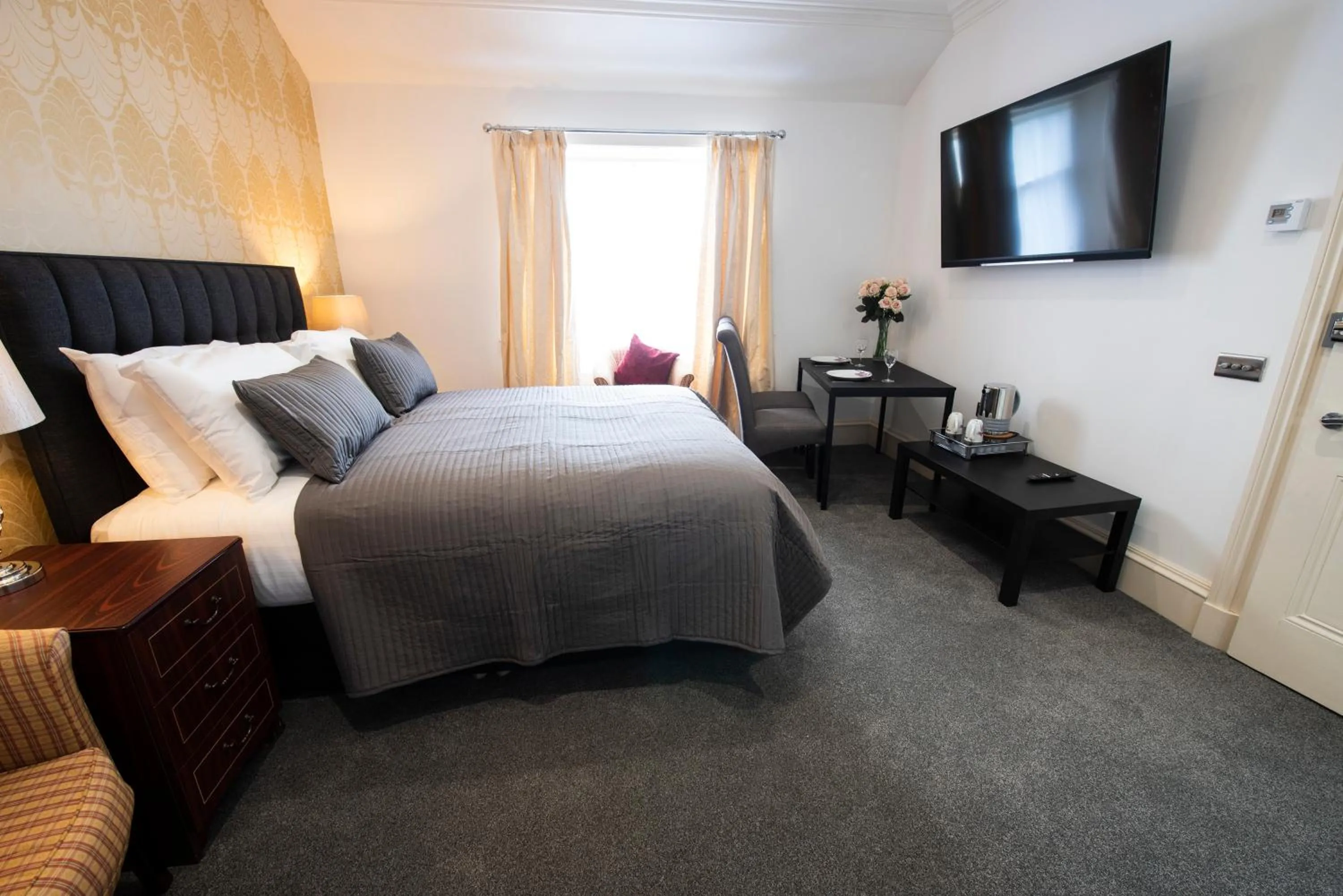 Bed in Grosvenor Suites