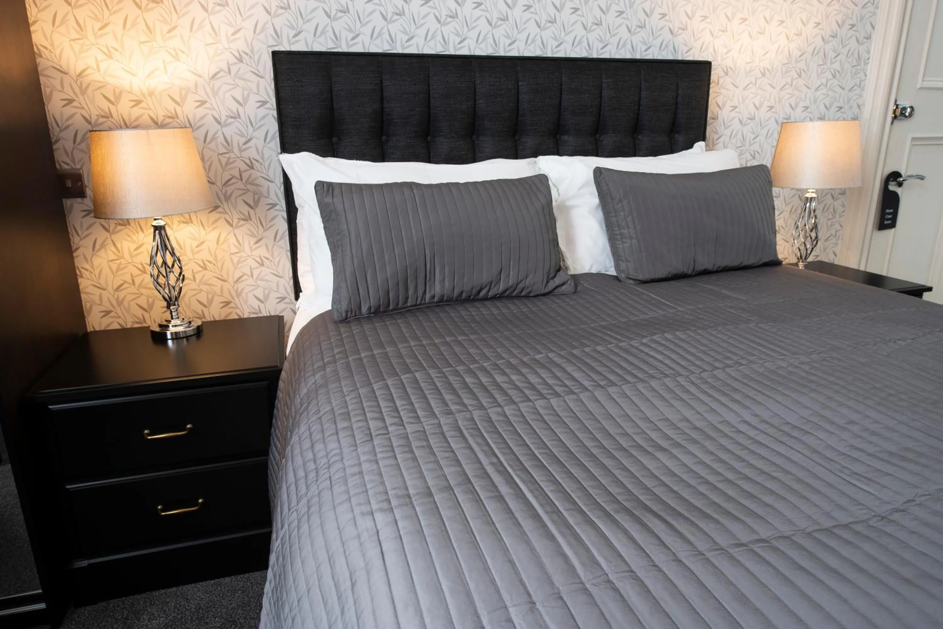 Bed in Grosvenor Suites