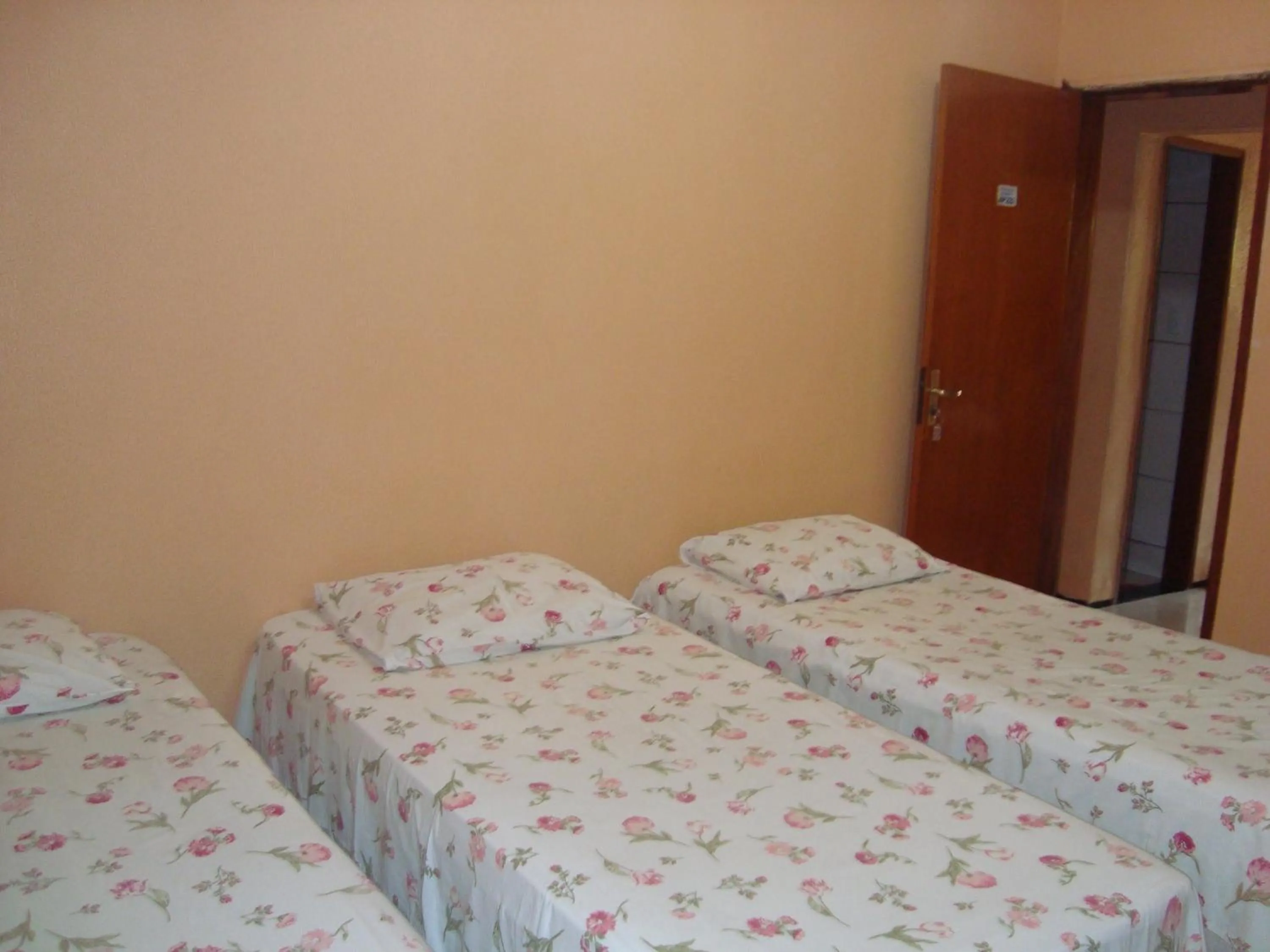 Bed in Pousada Vianna's