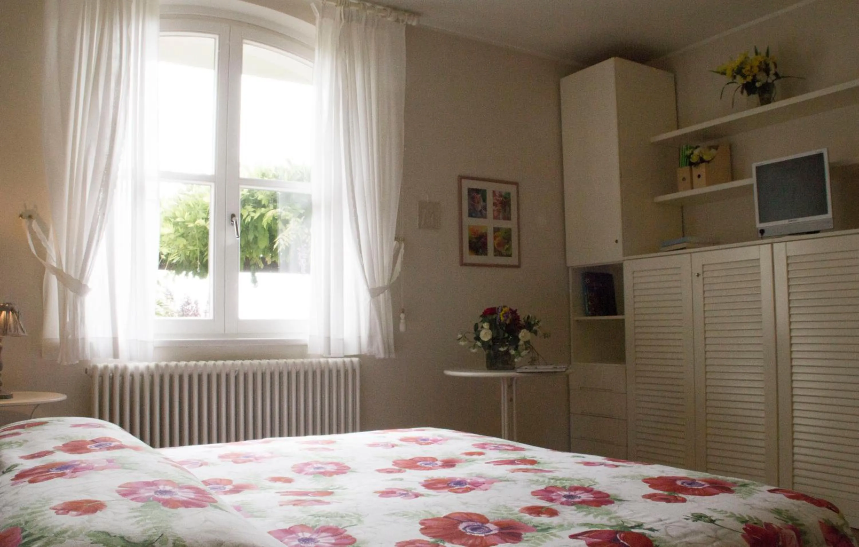 Photo of the whole room, Bed in Il Giardino delle Rose