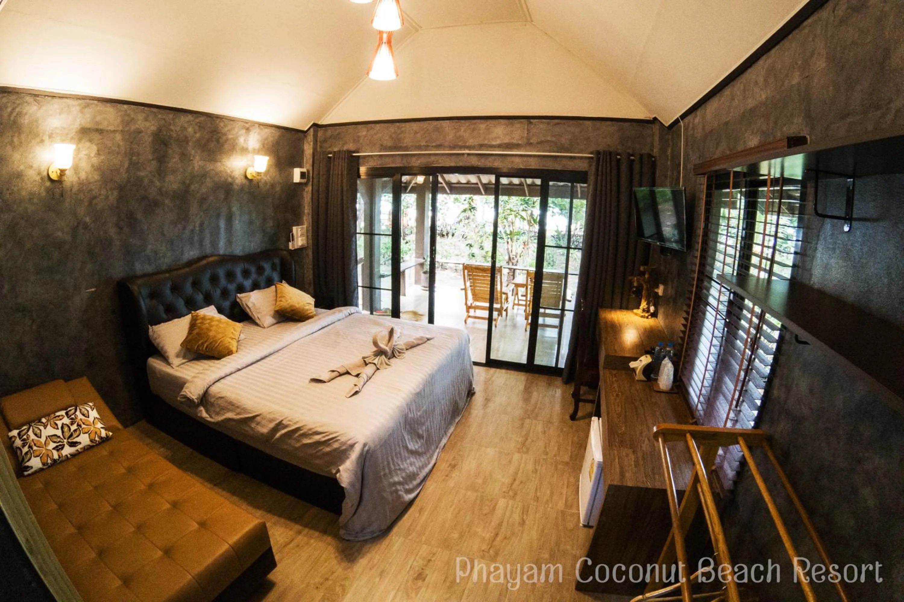 Bed in Phayam Coconut Beach Resort