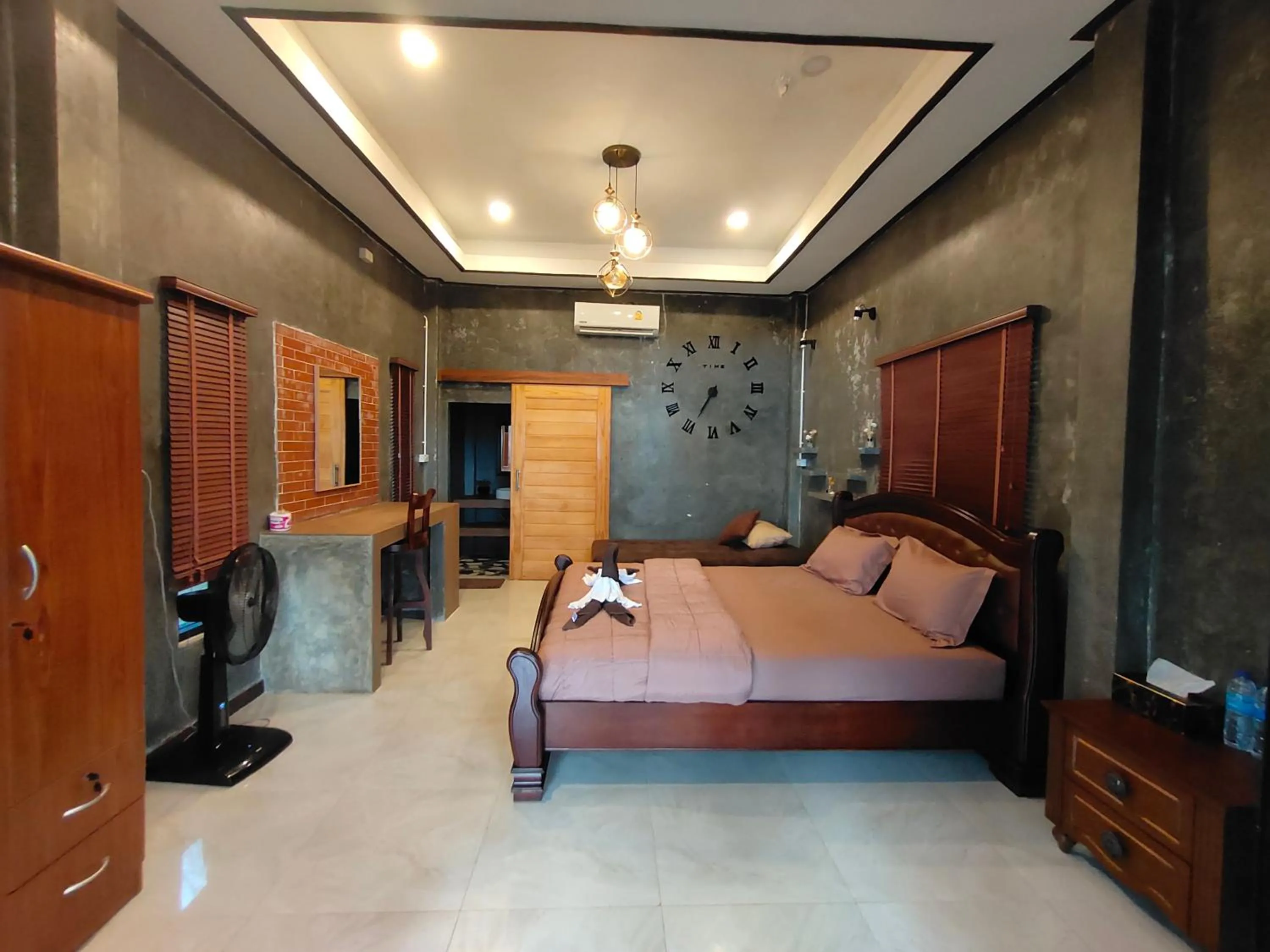 Bed in Phayam Coconut Beach Resort