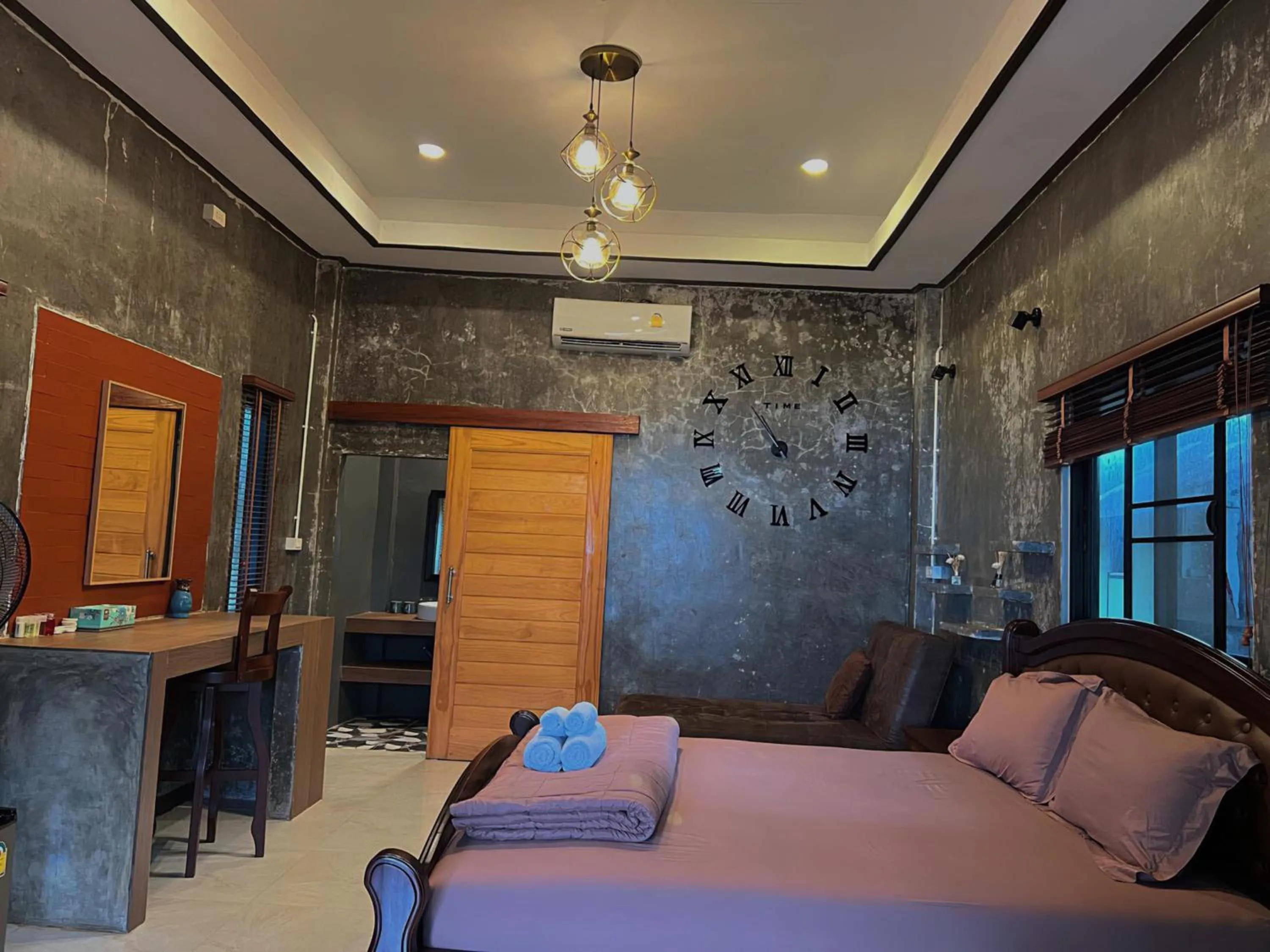 Bed in Phayam Coconut Beach Resort