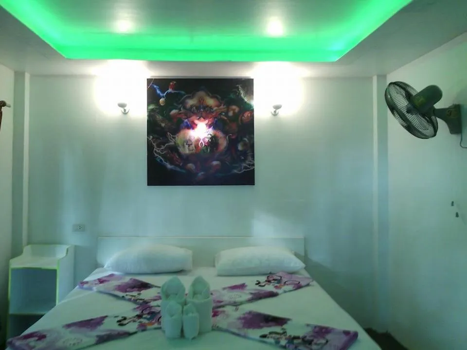 Bed in Phayam Coconut Beach Resort