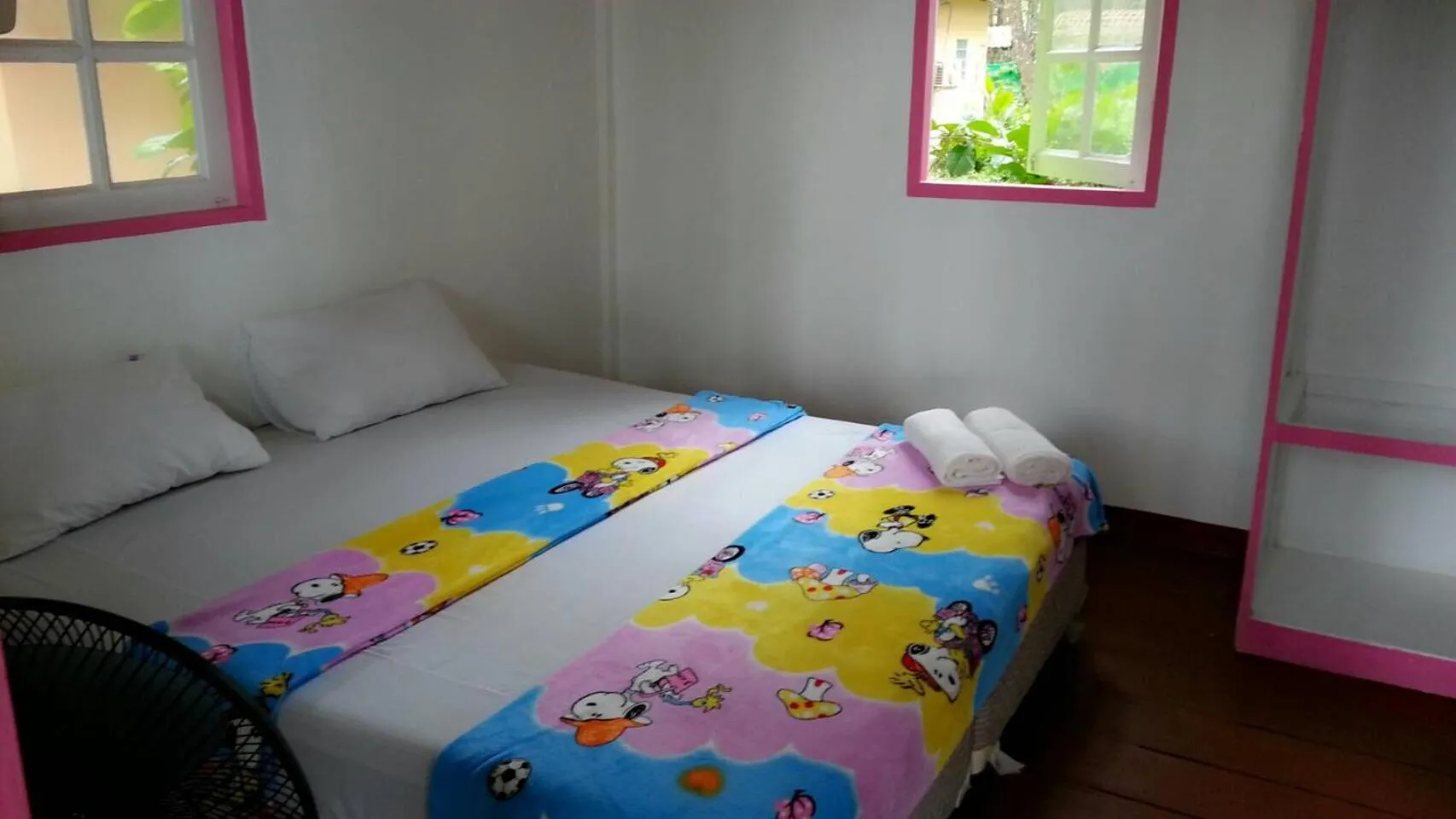 Bed in Phayam Coconut Beach Resort