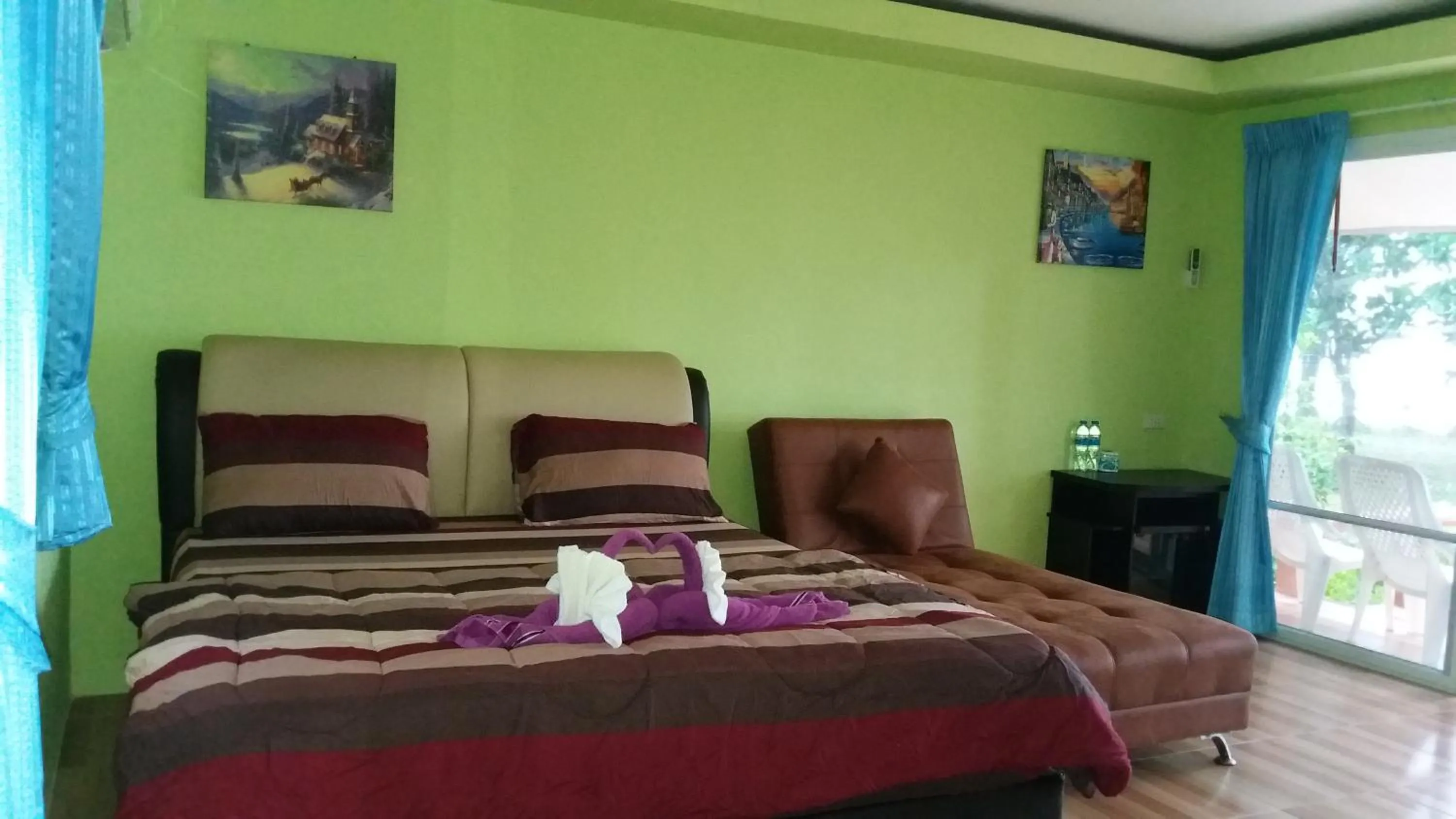 Bed in Phayam Coconut Beach Resort