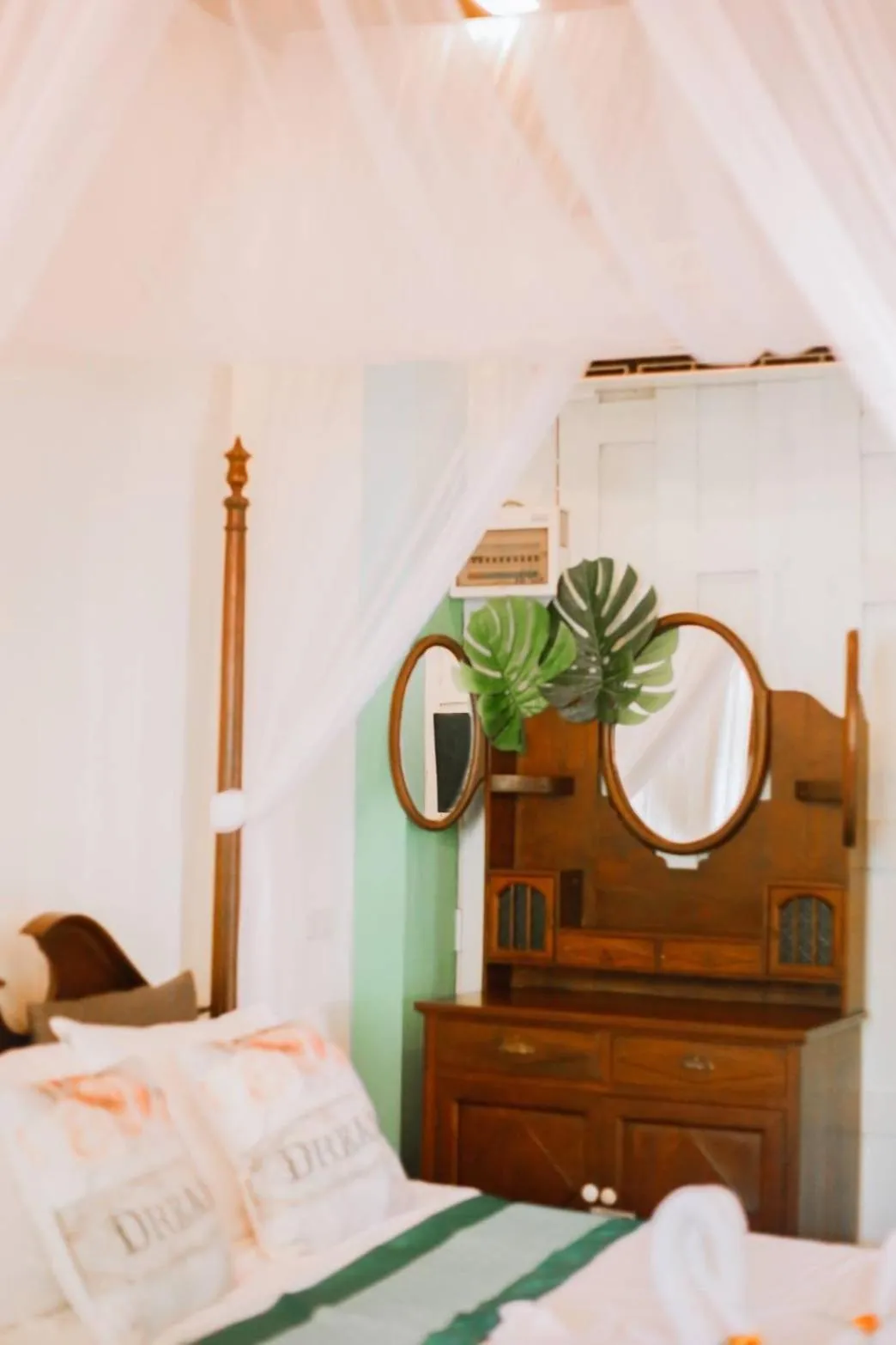 Bed in The Antique Riverside Resort