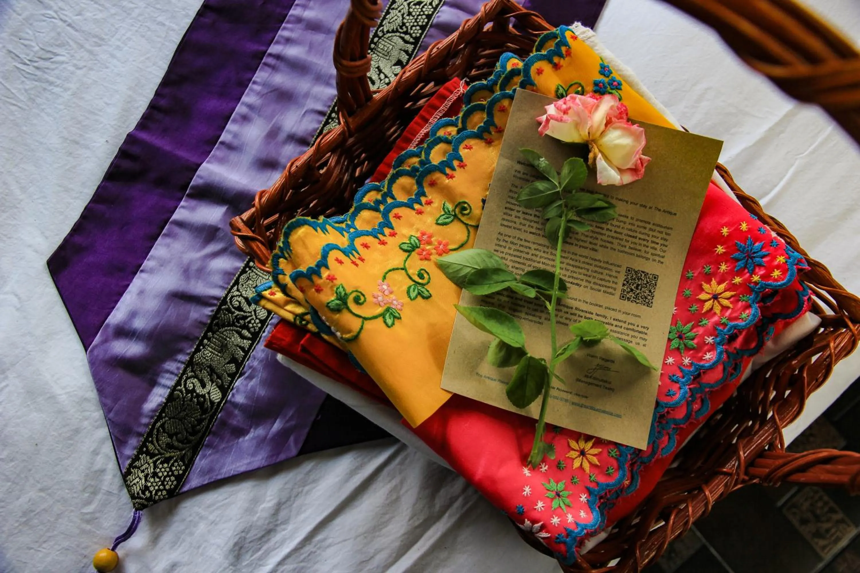 Bed in The Antique Riverside Resort