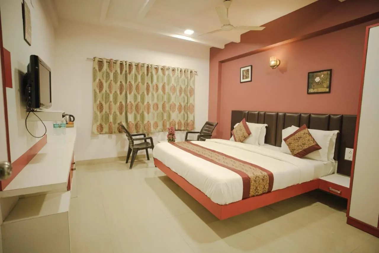 Bed in Hotel Ashapura Palace
