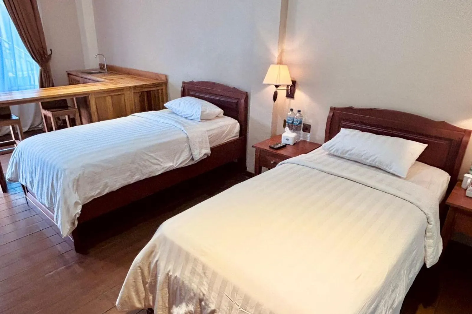 Bed in Thong's Inn Hotel Kualanamu