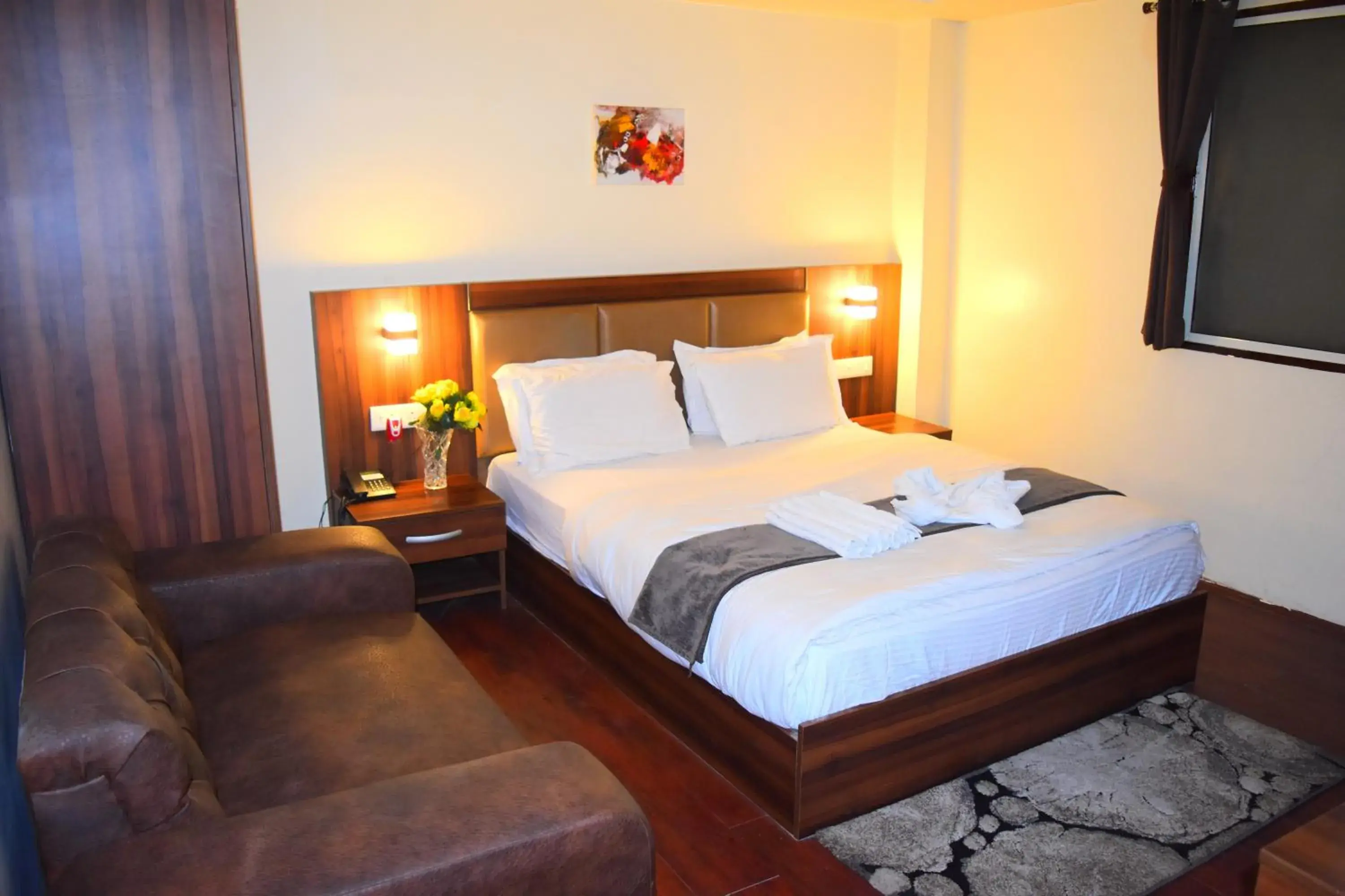 Deluxe Room in Amba Regency Deluxe Room in Amba Regency