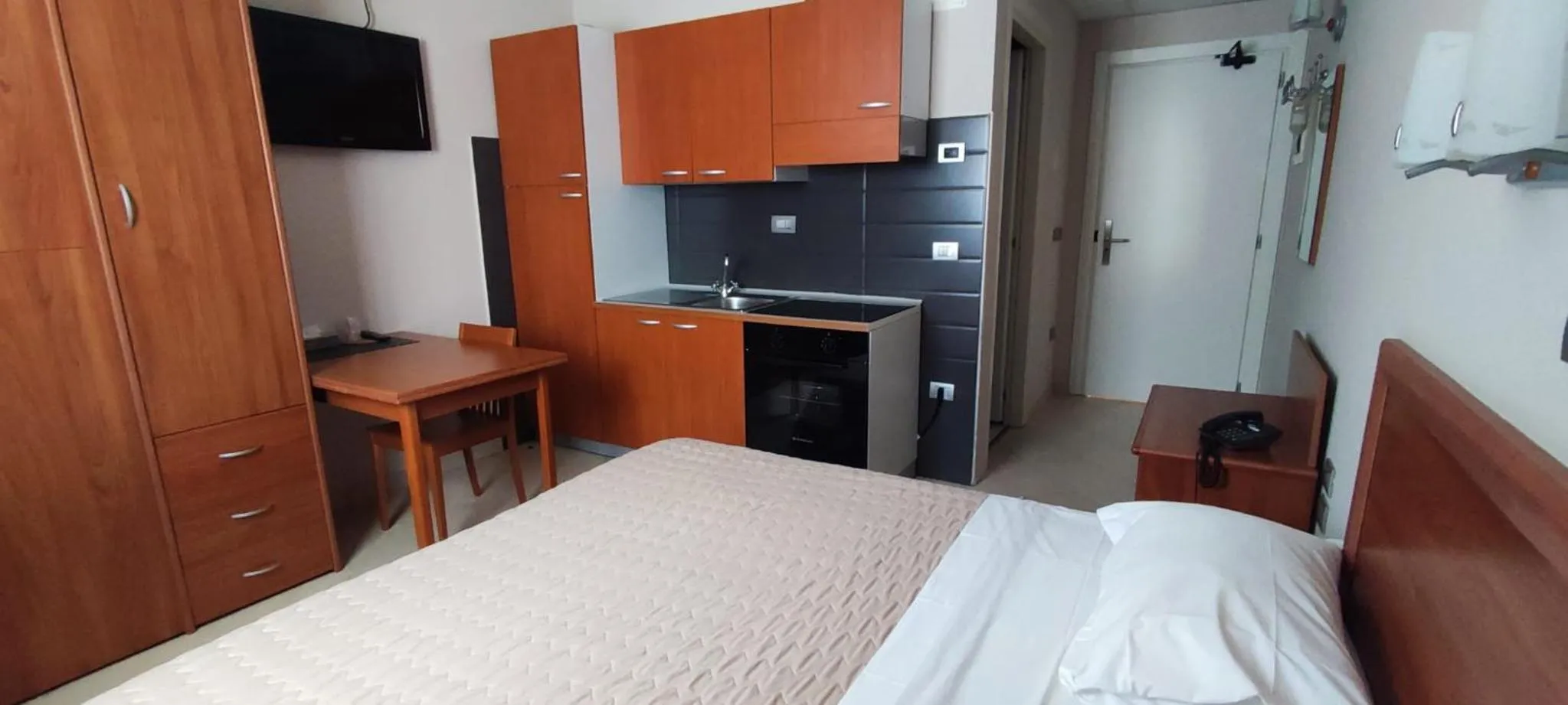 Photo of the whole room, Bed in Standard Hotel Udine