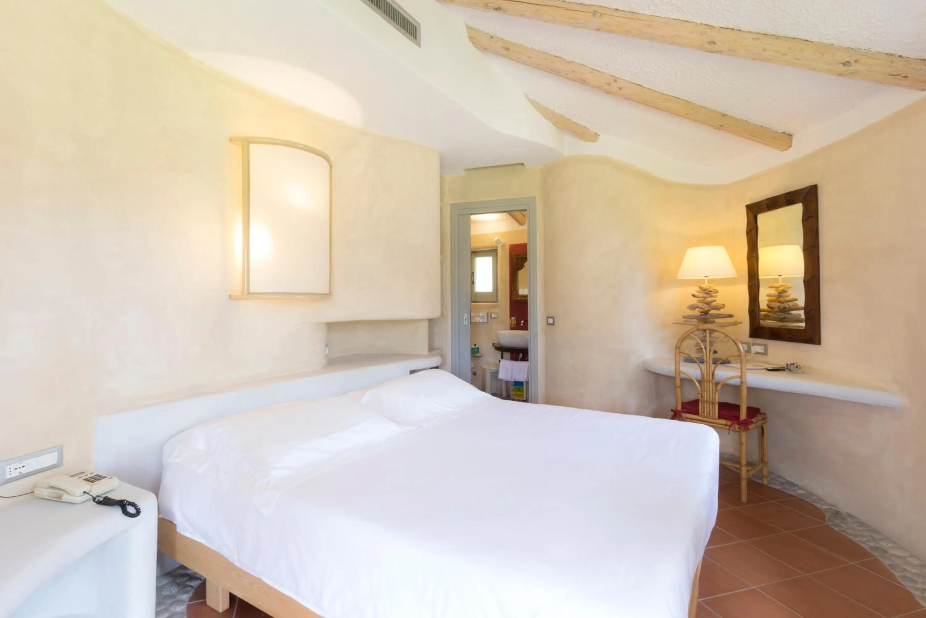 Bed in Baia Del Sole Resort