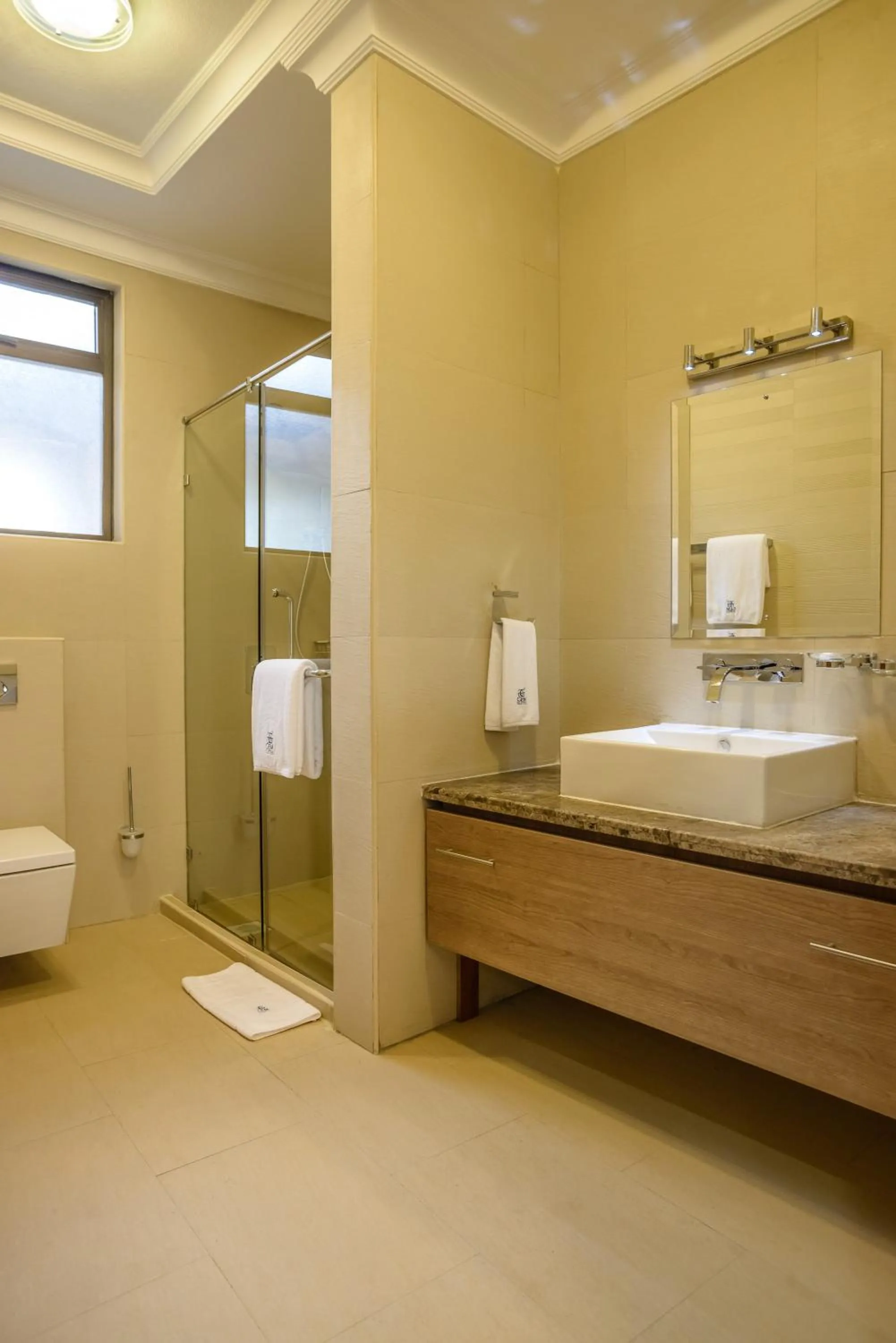 Shower in GemSuites Riverside Serviced Apartments and Hotel, Nairobi