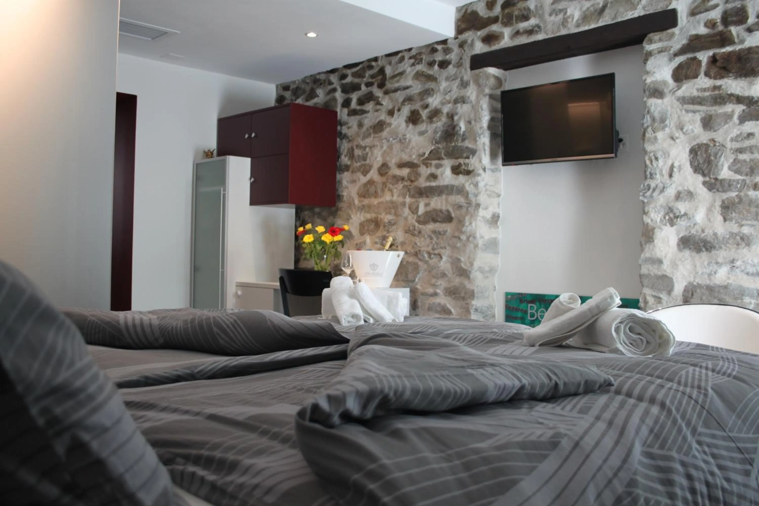 Photo of the whole room, Bed in Albergo Porta Verzasca