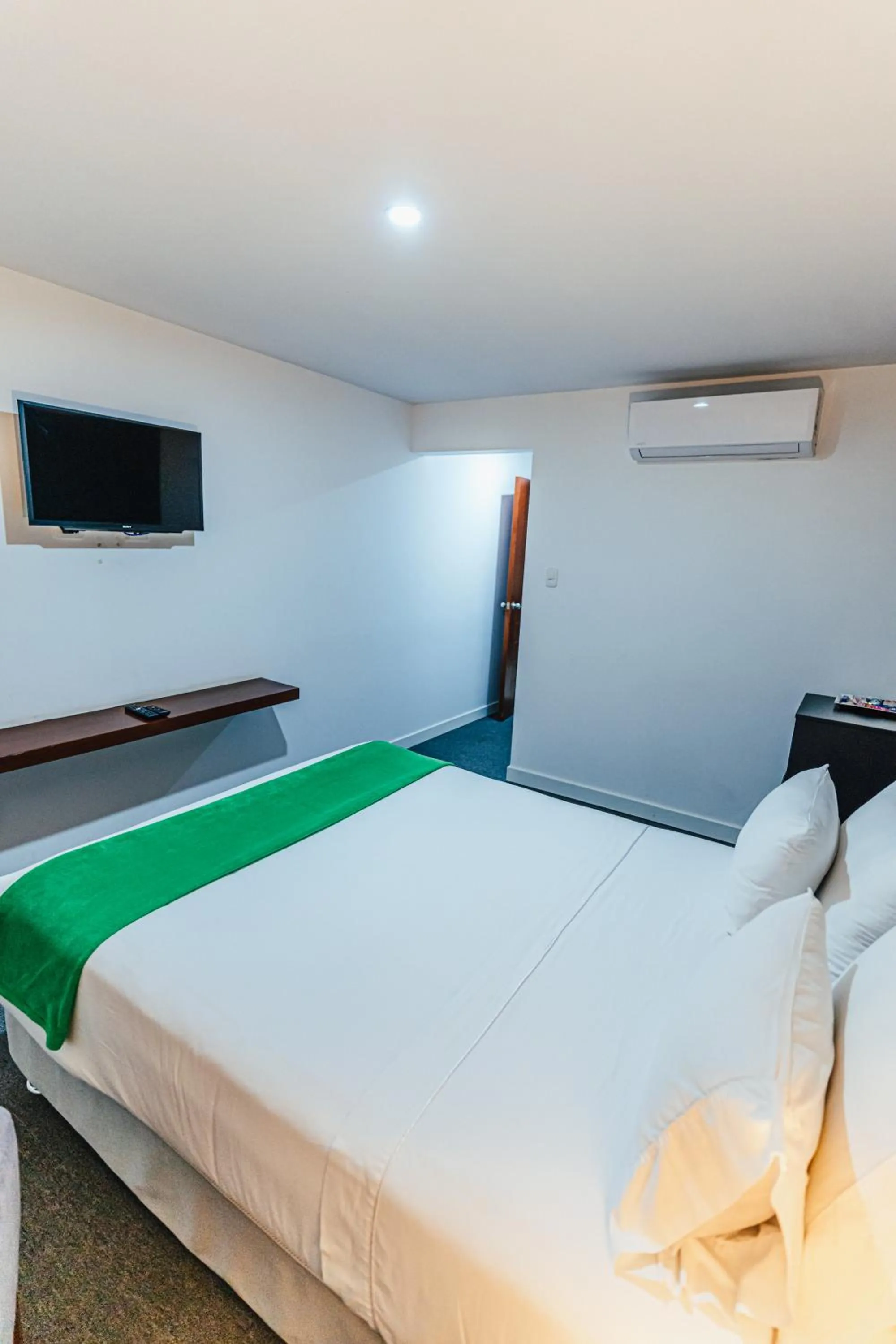 Bed in Hotel Hacienda Lima Norte