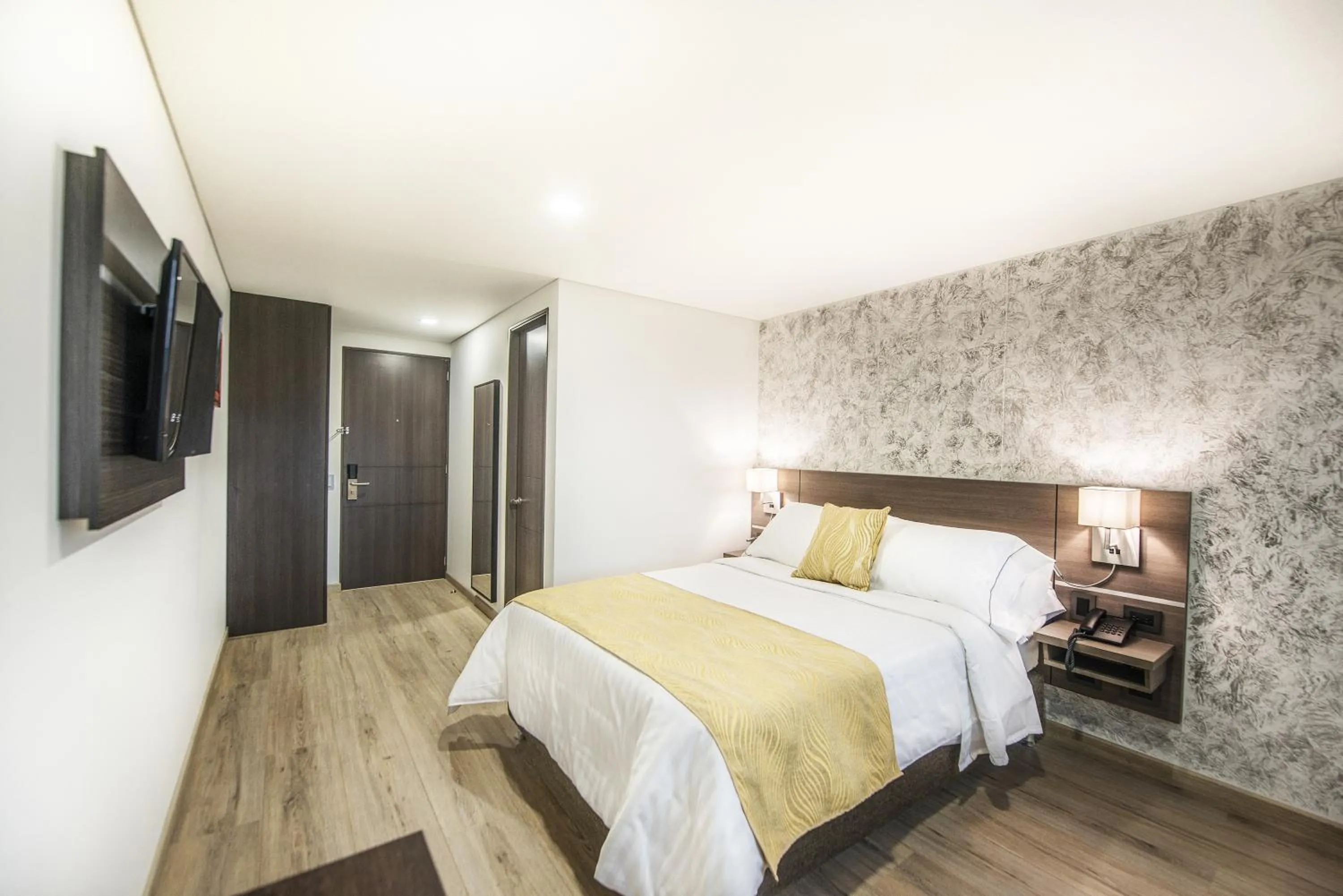 Bed in SM Grand Hotel