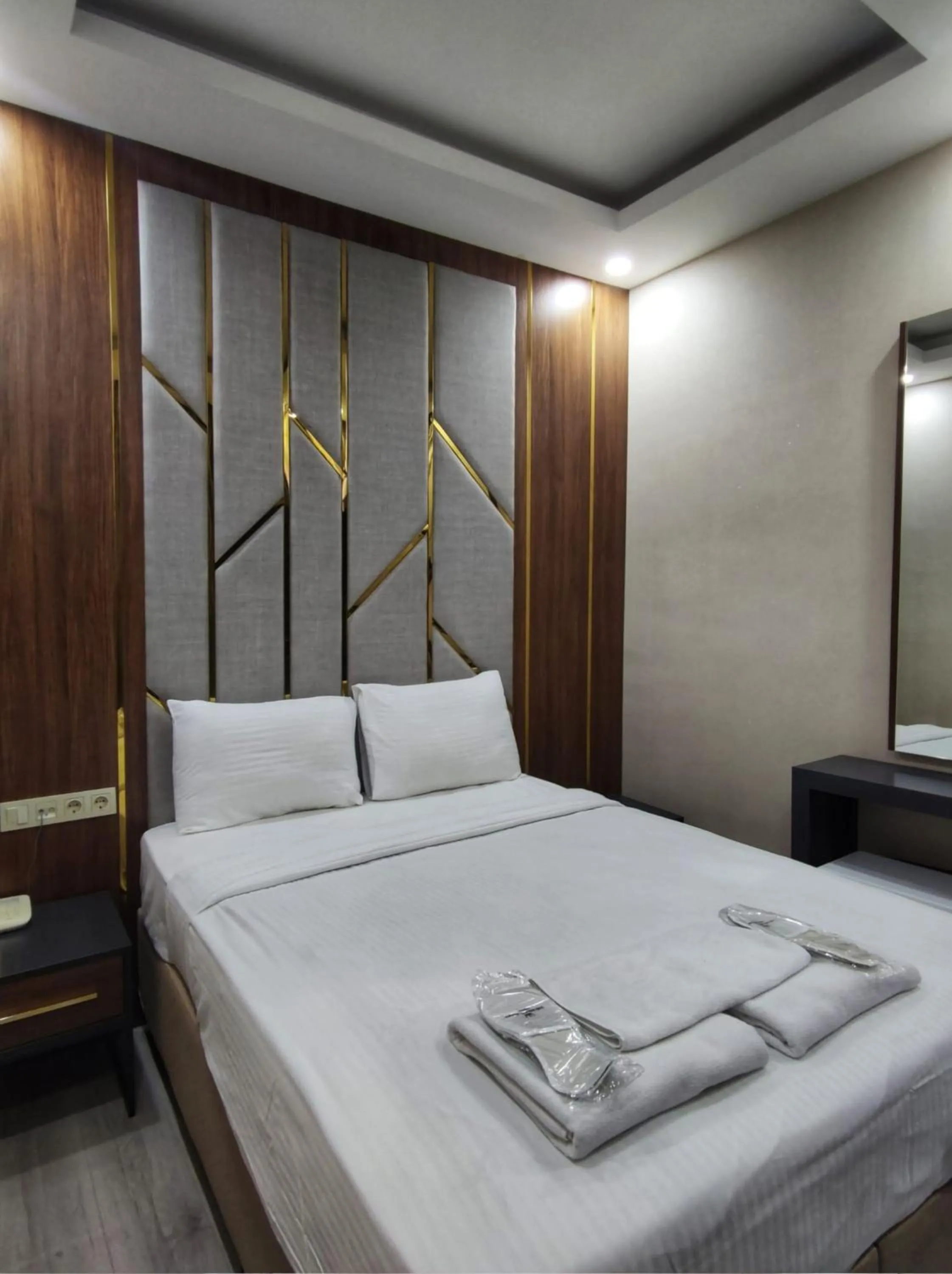 TV and multimedia, Bed in The Golden Pera's Hotel & Spa