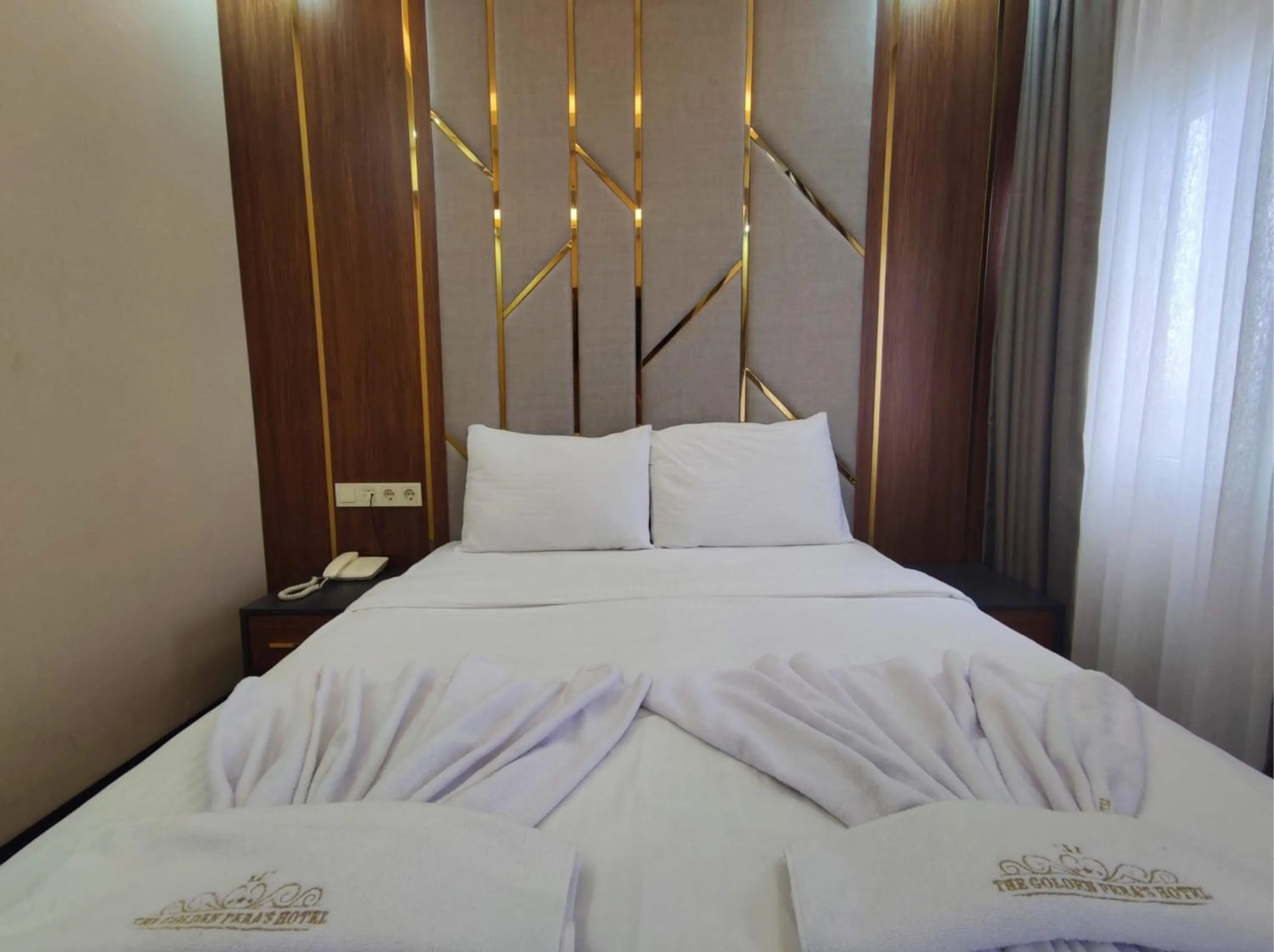 Bed in The Golden Pera's Hotel & Spa