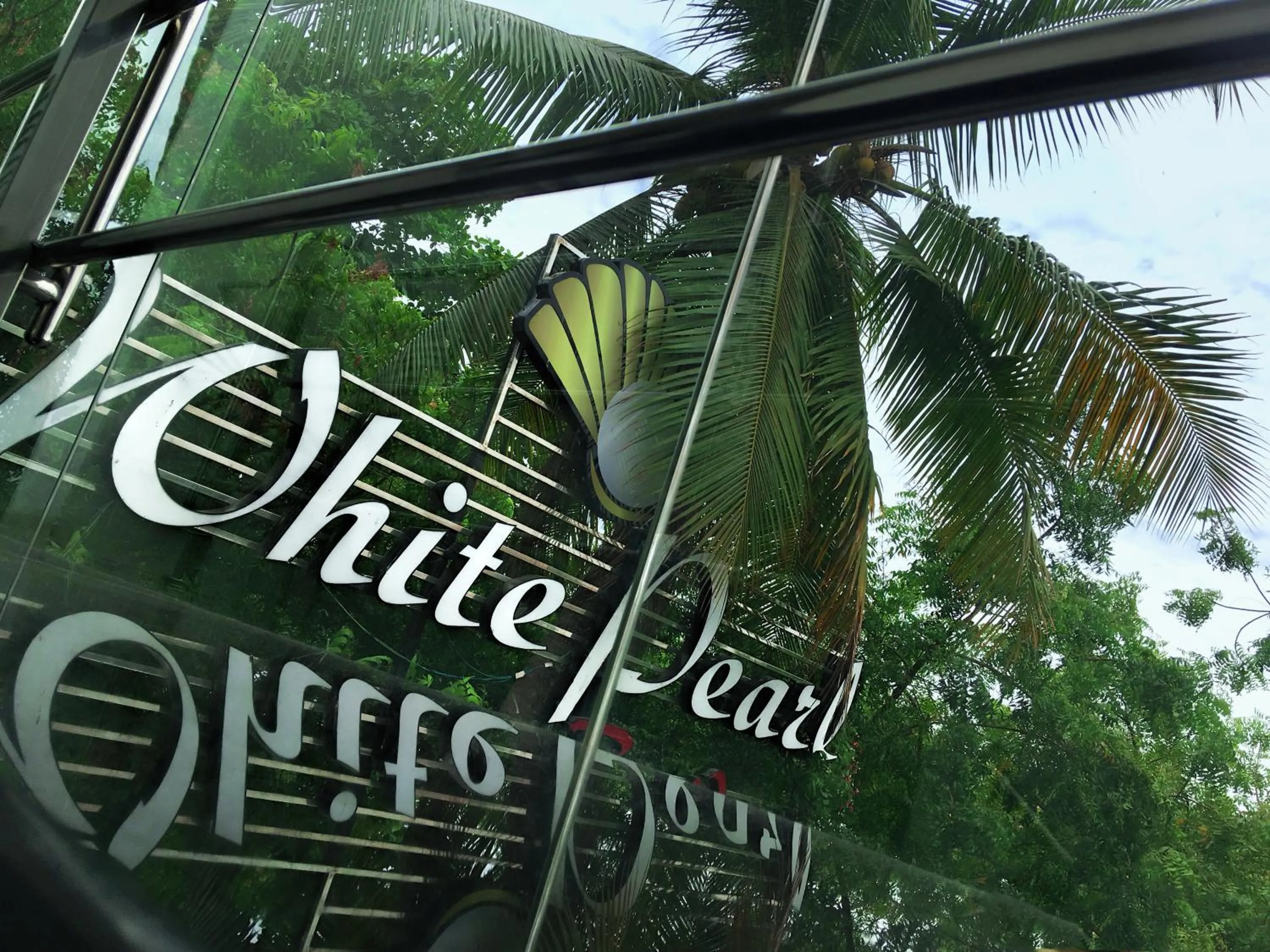 Property logo or sign in White Pearl Residency