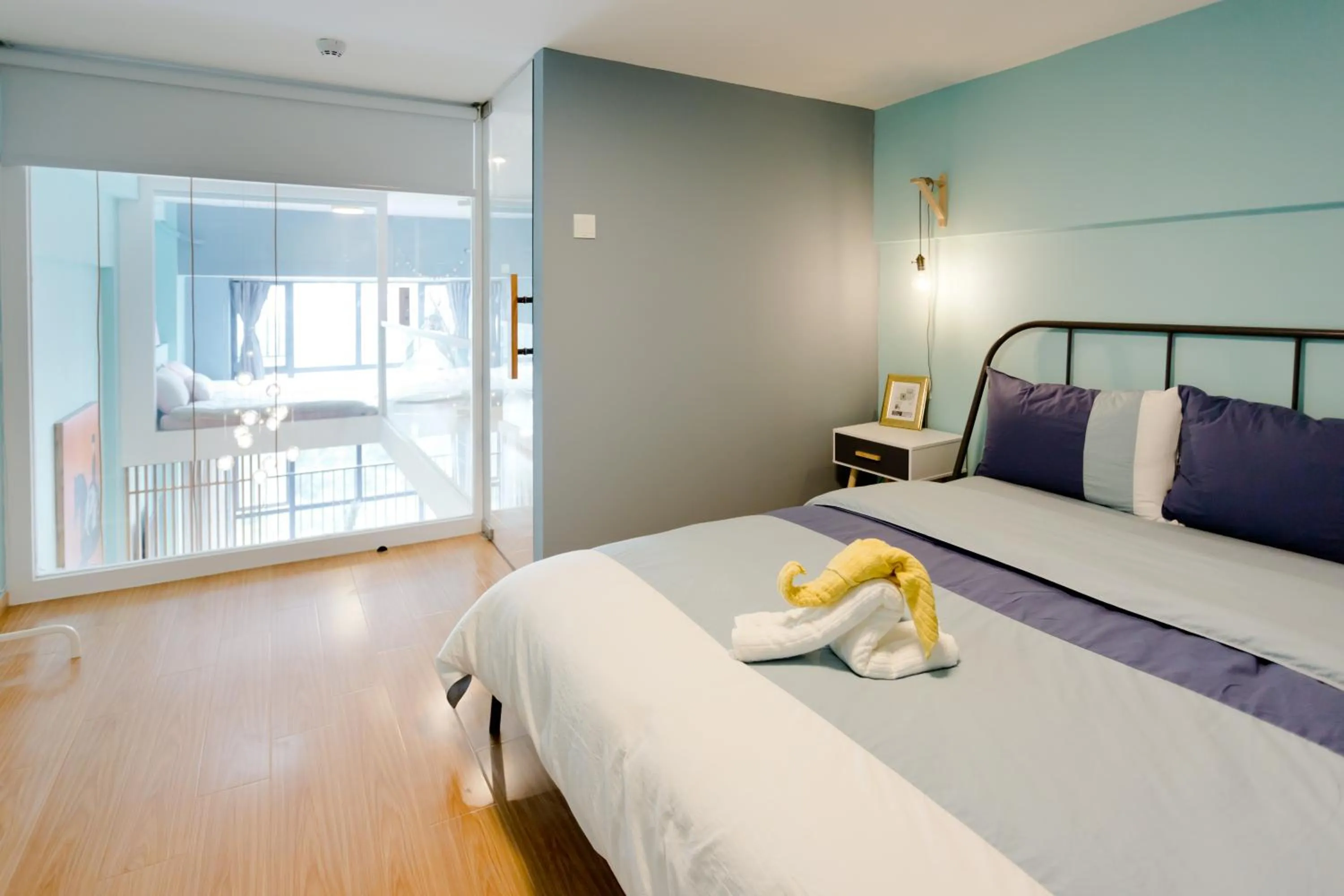 Bed in Lavender Apartment Branch