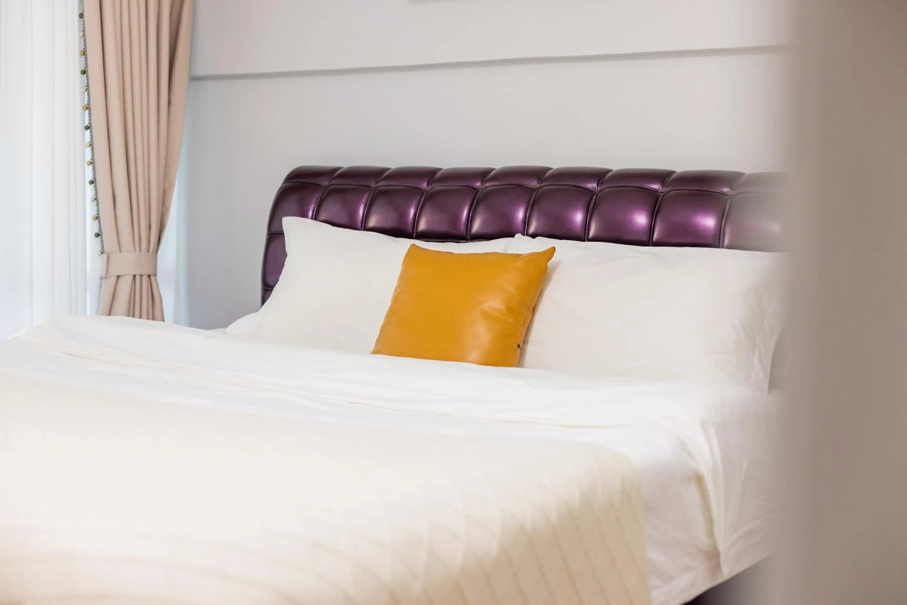 Bed in Lavender Apartment Branch