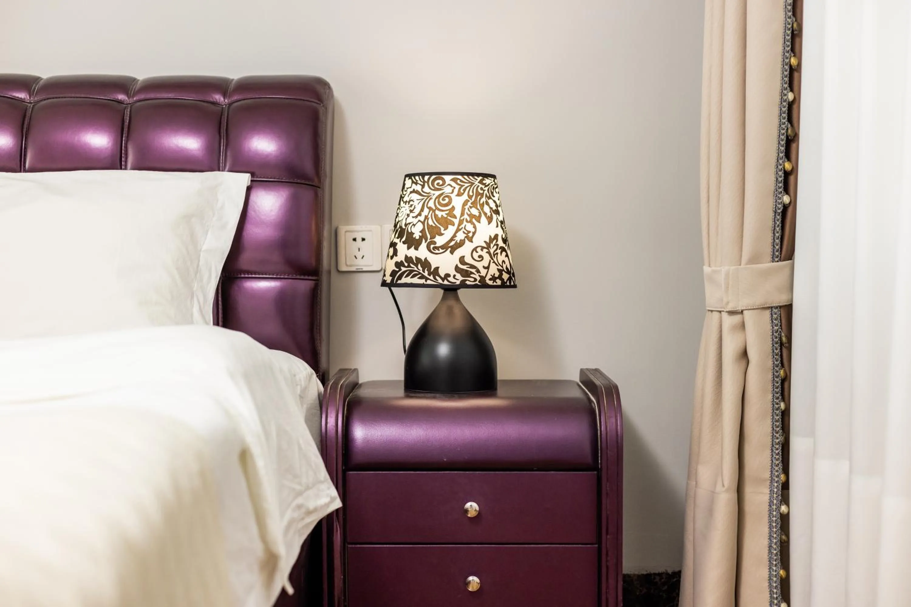 Bed in Lavender Apartment Branch