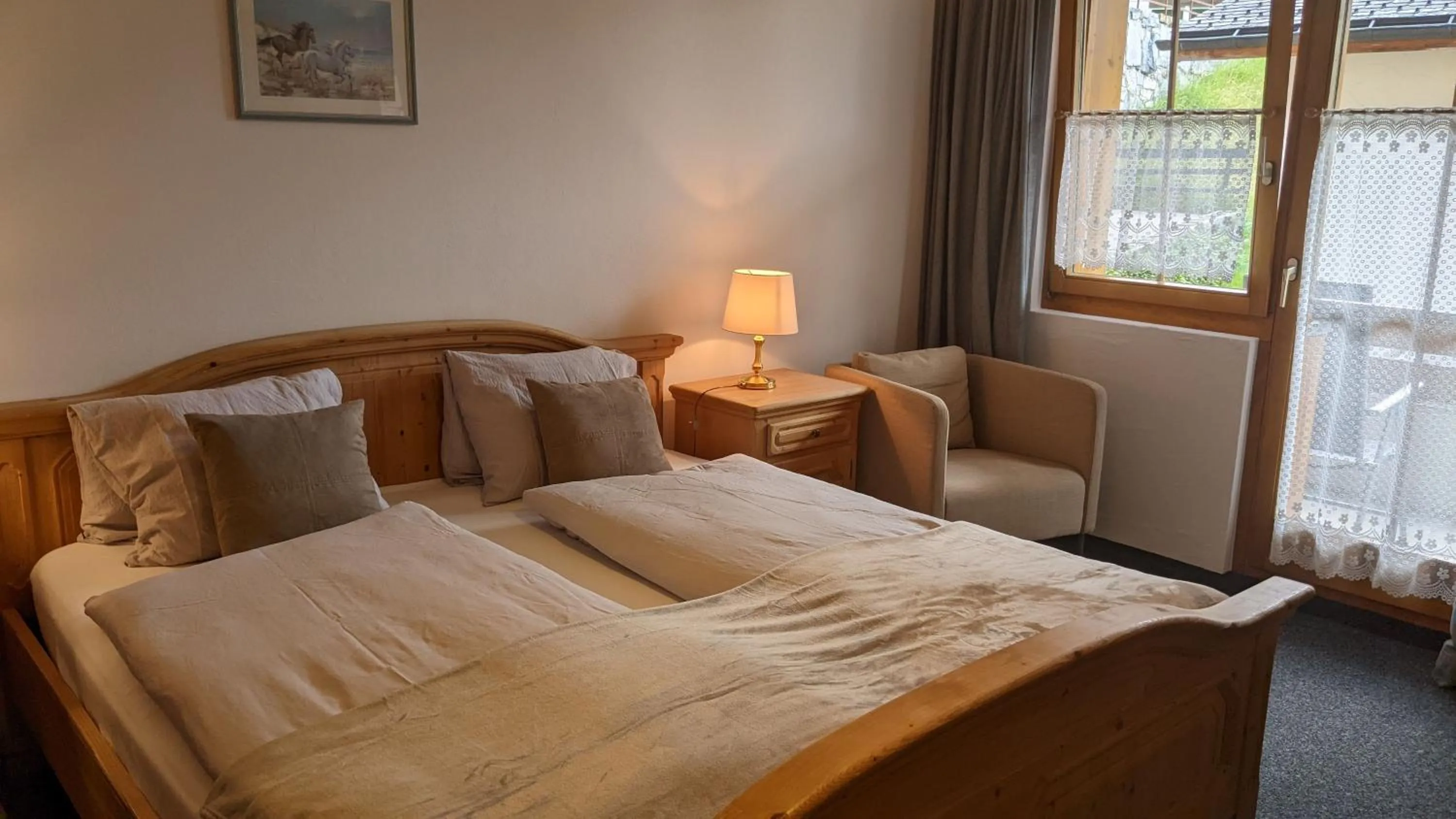 Bed in Hotel Beau-Séjour