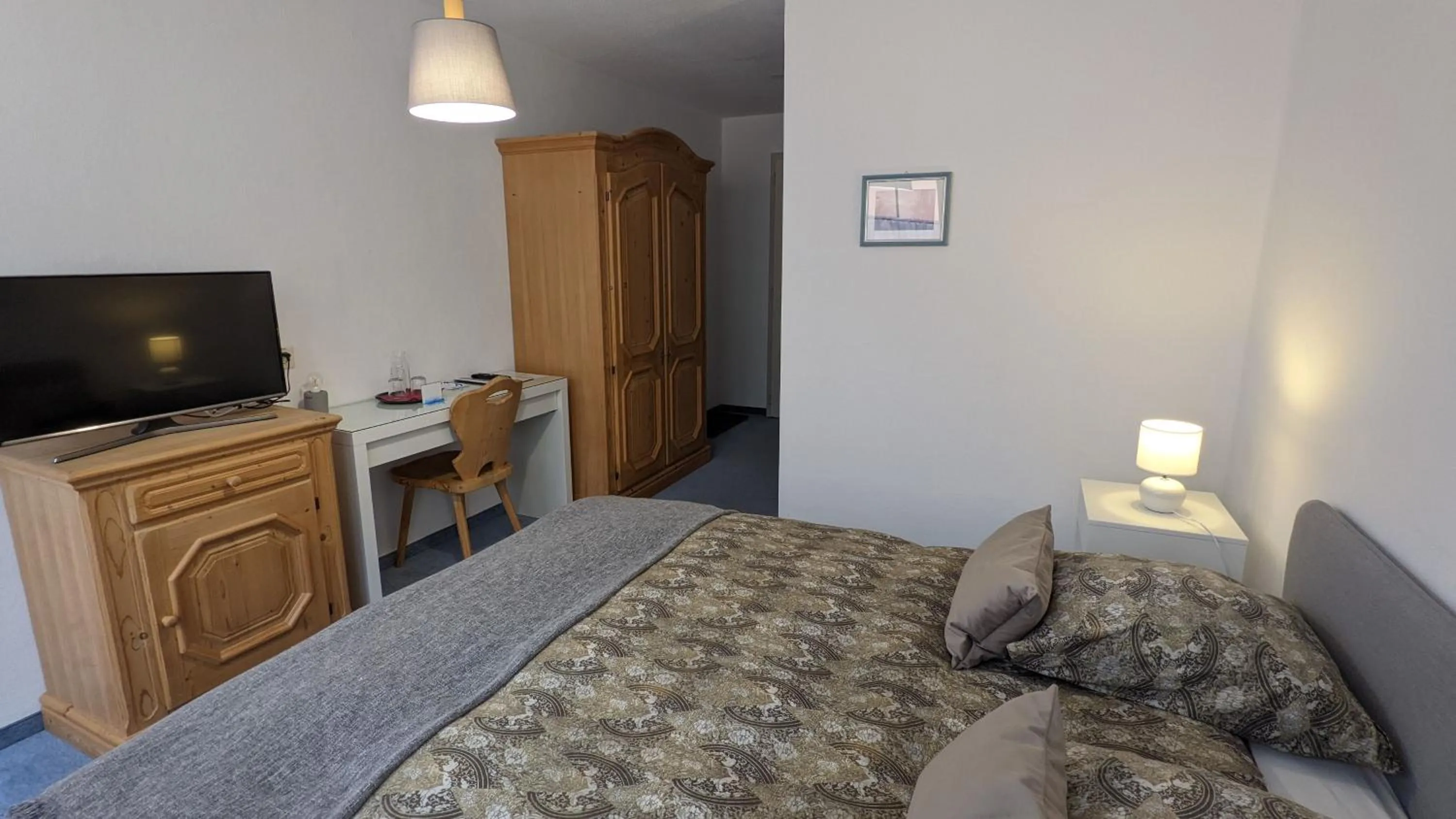 Bed in Hotel Beau-Séjour