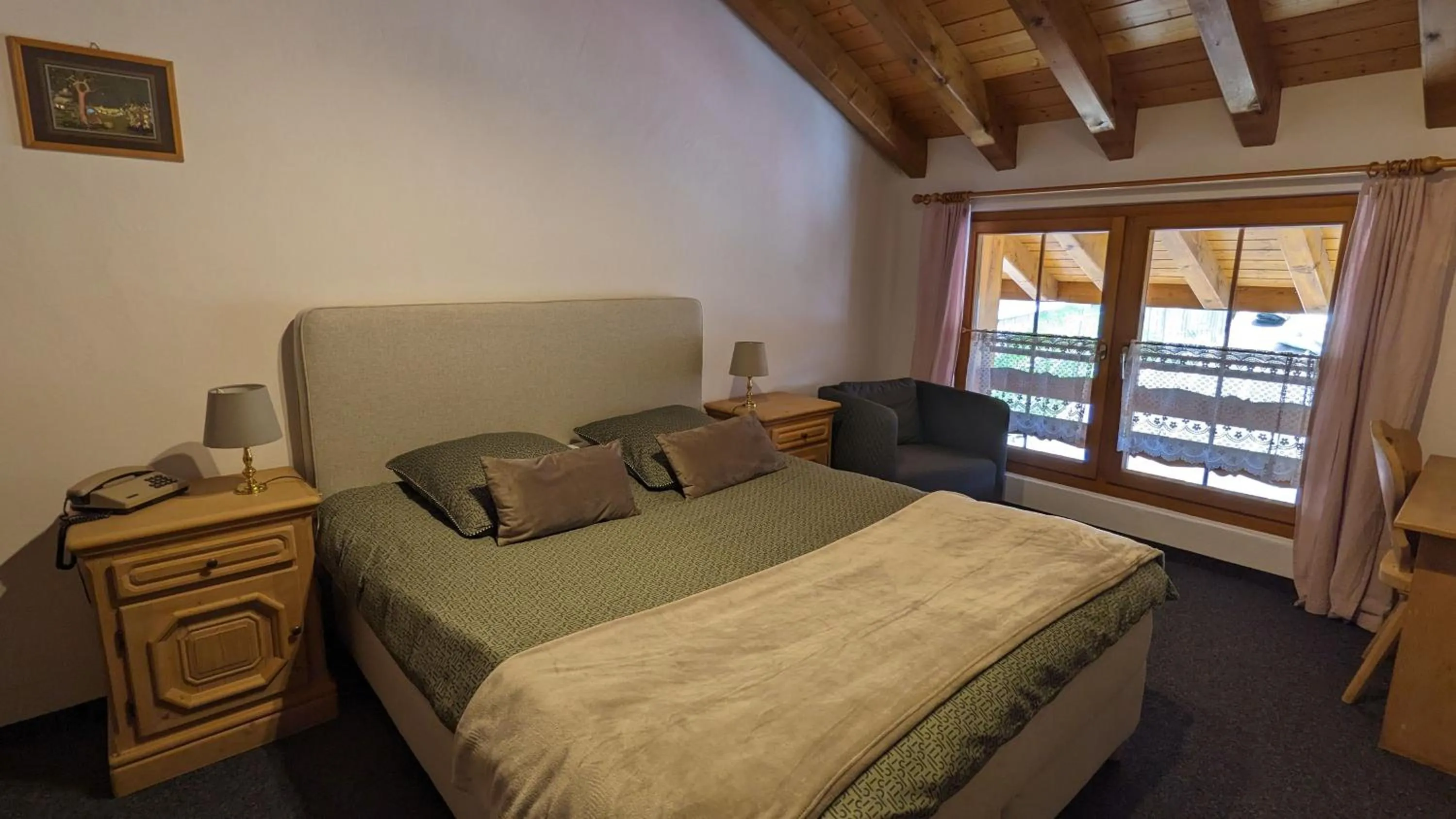 Bed in Hotel Beau-Séjour