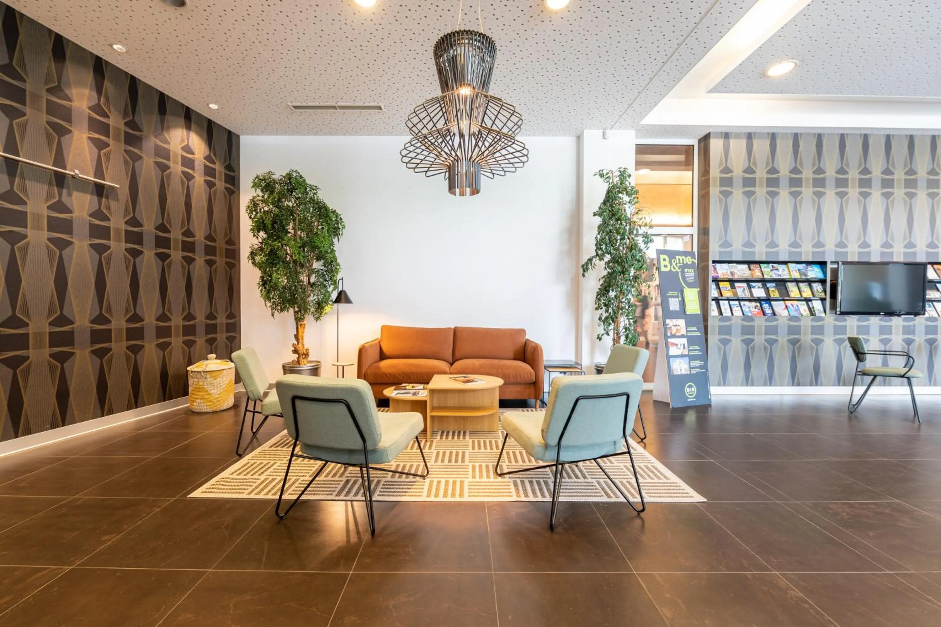 Living room in B&B HOTEL Lully 3 Lakes