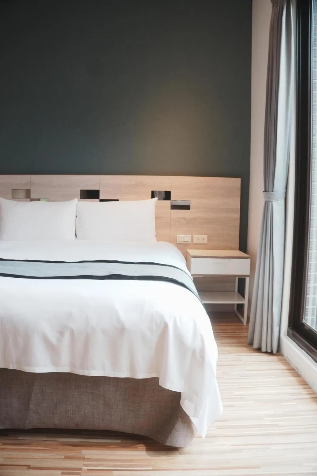 Bed in Ruo Shui Hotspring Hotel