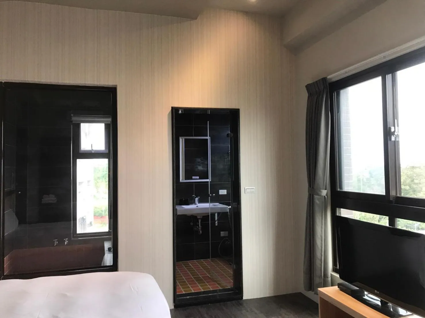 Bed in Ruo Shui Hotspring Hotel