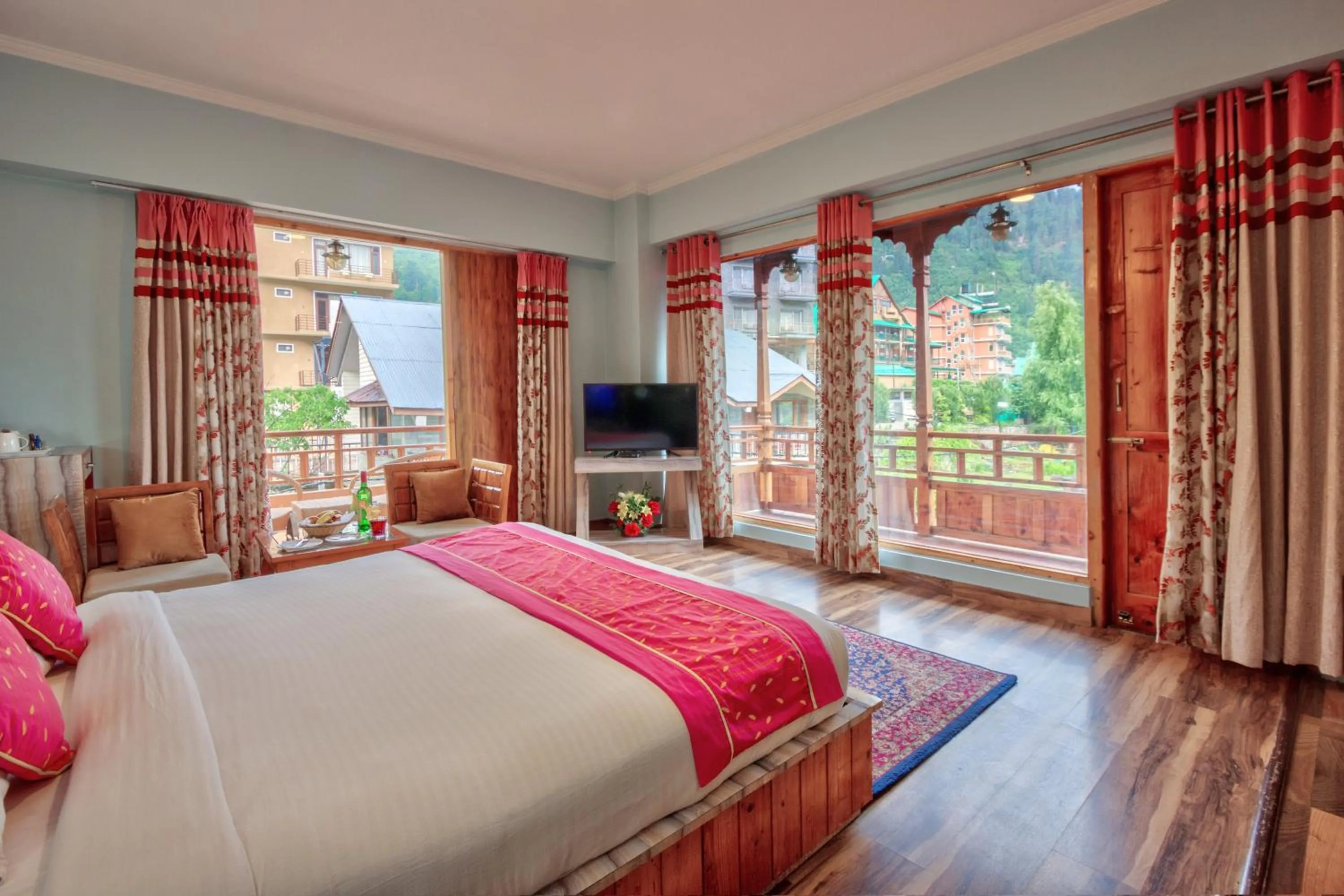 Bed in Snow Flakes Resort And Spa Centrally Heated Luxury Resort