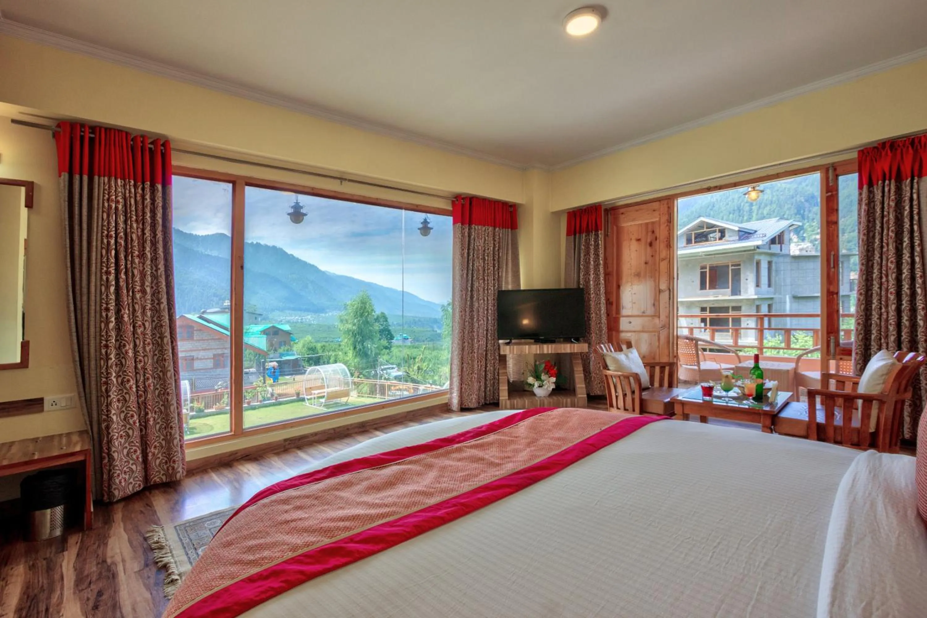 Bed in Snow Flakes Resort And Spa Centrally Heated Luxury Resort