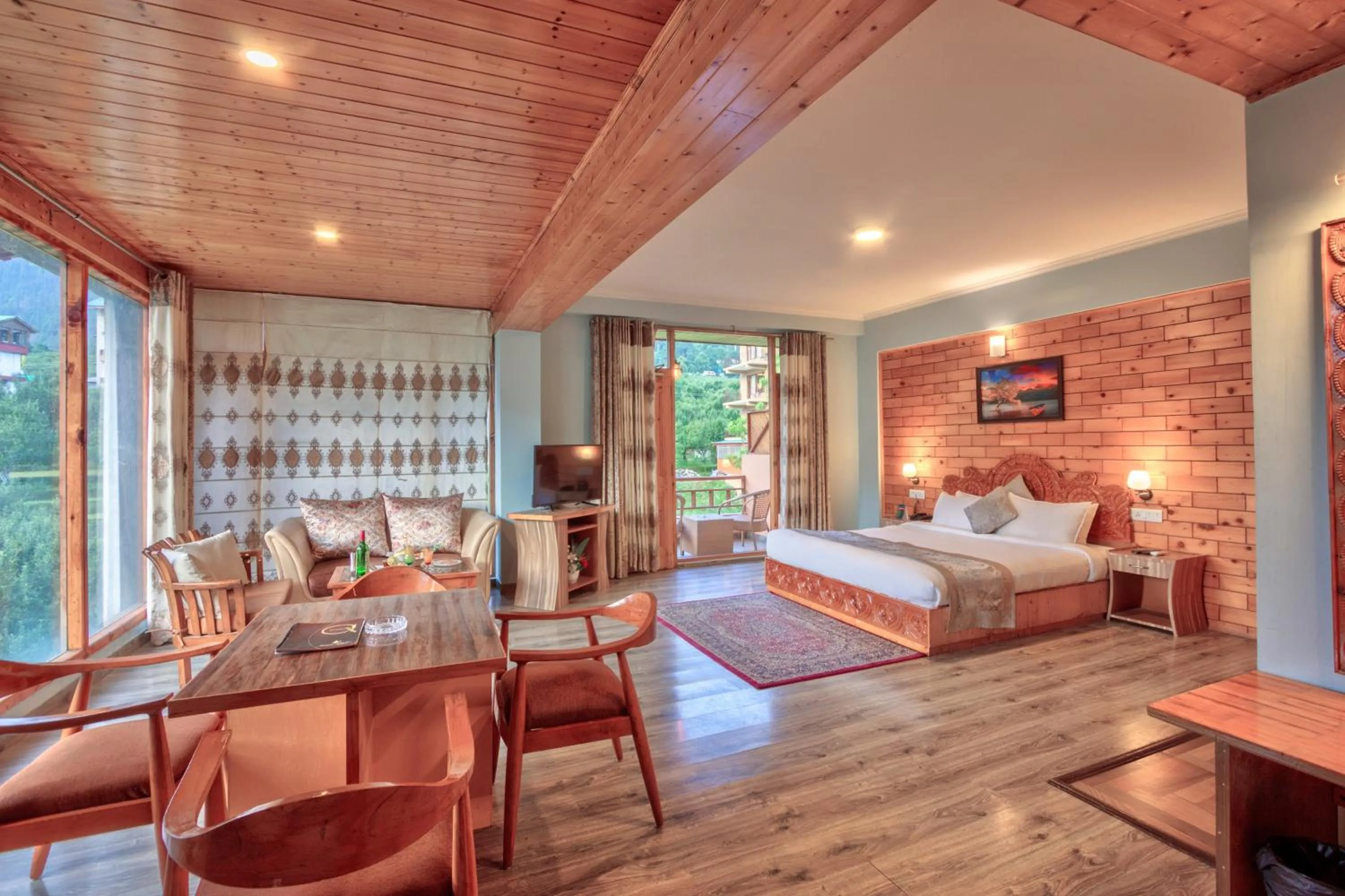 Living room, Bed in Snow Flakes Resort And Spa Centrally Heated Luxury Resort